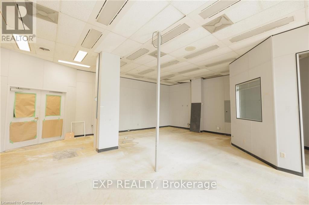 110 - 30 Duke Street W, Kitchener, Ontario  N2H 3W4 - Photo 9 - X12250271