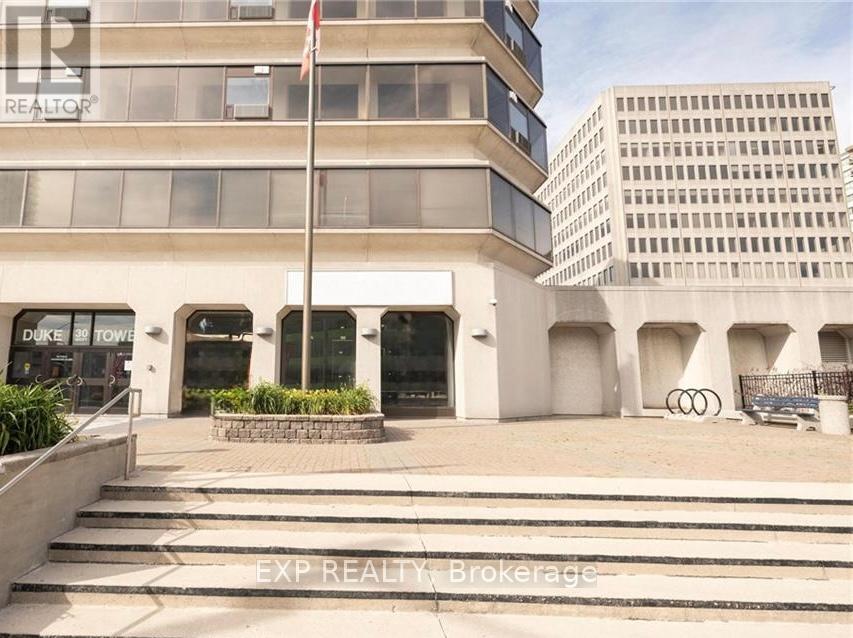 110 - 30 Duke Street W, Kitchener, Ontario  N2H 3W4 - Photo 2 - X12250271