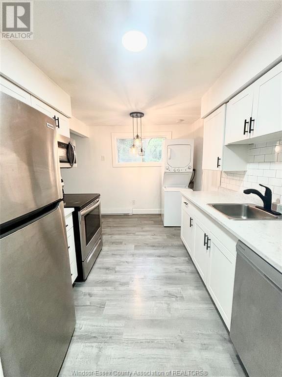 MLS# 25016335: 3150 PETER STREET Unit# 3, Windsor, Canada