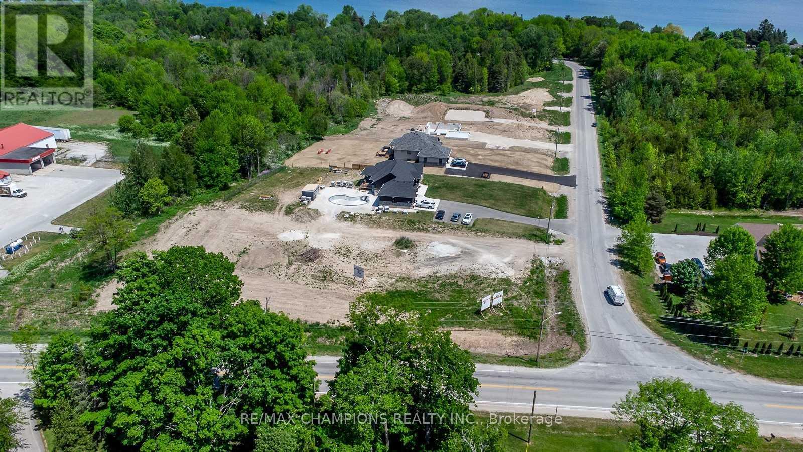 106 Balmy Beach Road, Georgian Bluffs, Ontario  N4K 5N4 - Photo 3 - X12251555