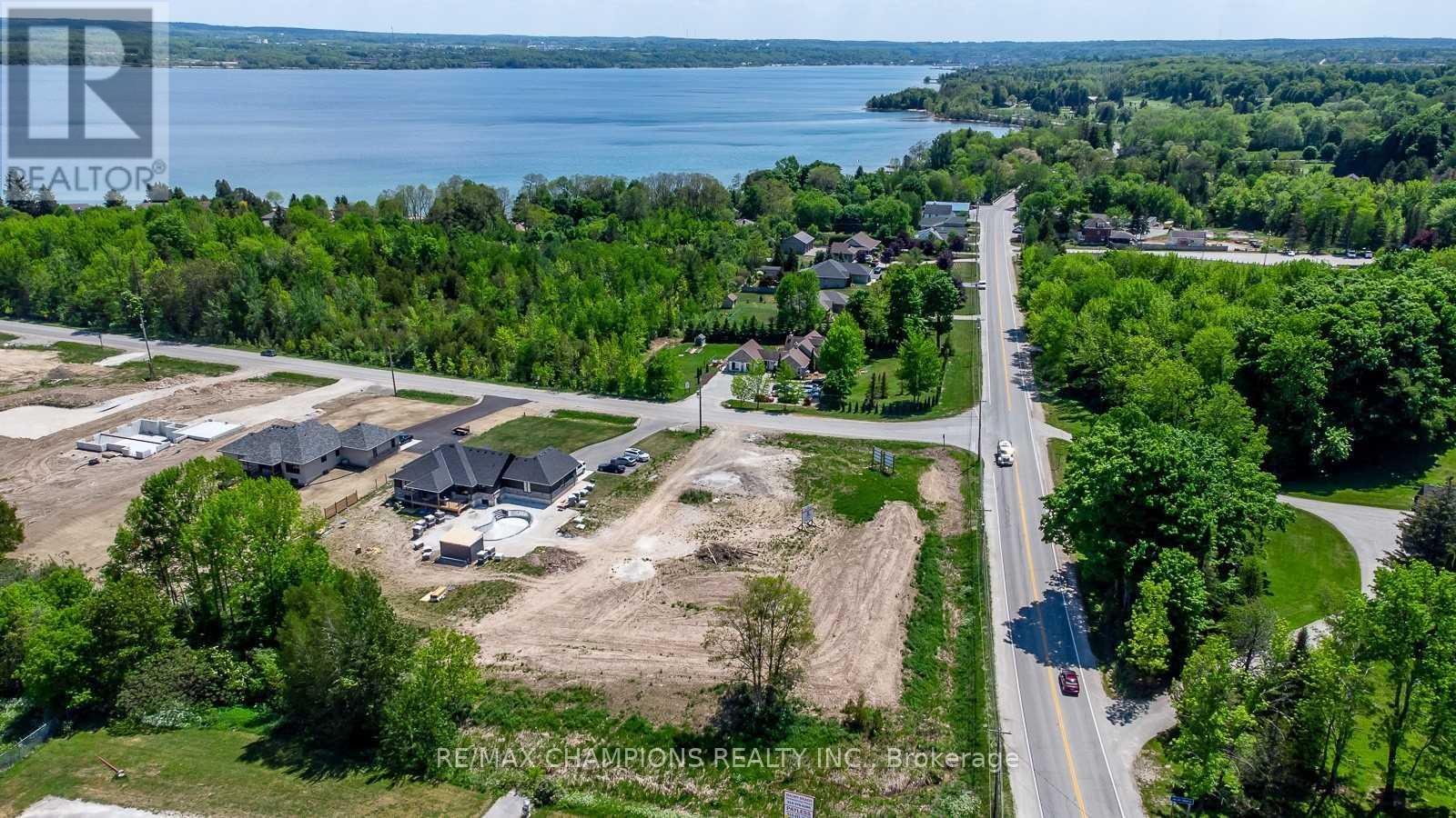 106 Balmy Beach Road, Georgian Bluffs, Ontario  N4K 5N4 - Photo 4 - X12251555