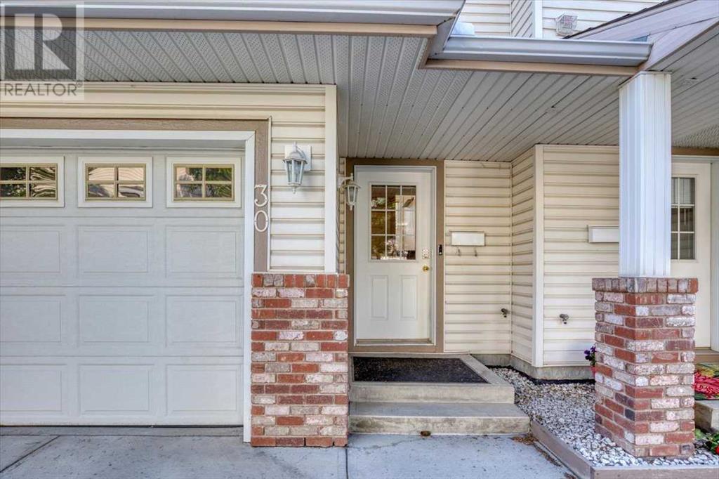 Property at 30 Country Hills Cove NW image 2