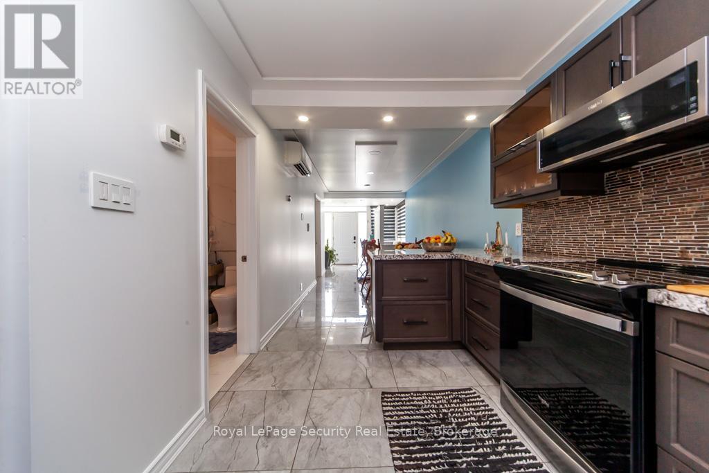 44 Woodgate Drive, Toronto, Ontario  M6N 4W3 - Photo 11 - W12256210