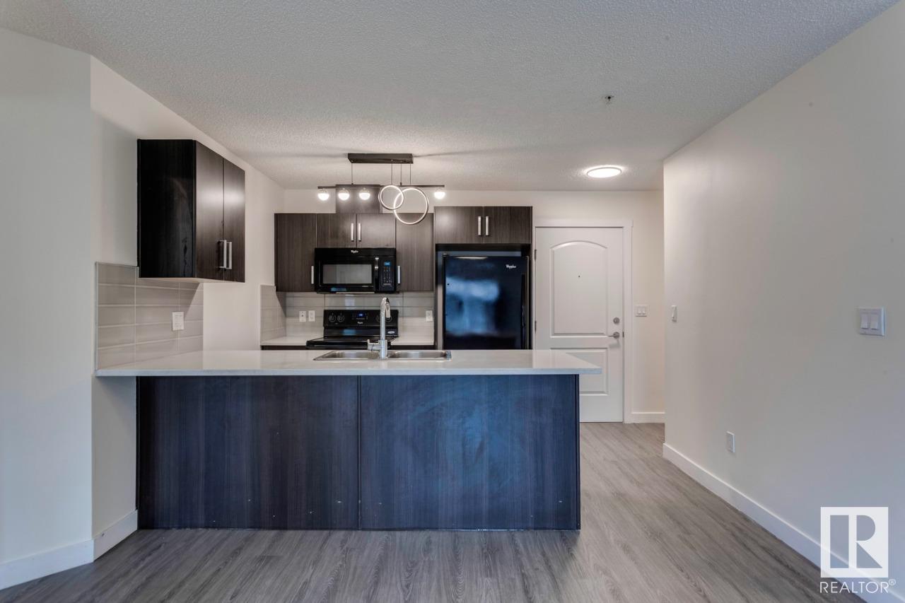 Property at #102 667 WATT BV SW image 1