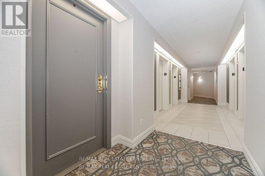514 - 35 Kingsbridge Garden Circle, Mississauga, Ontario  L5R 3Z5 - Photo 4 - W12259099