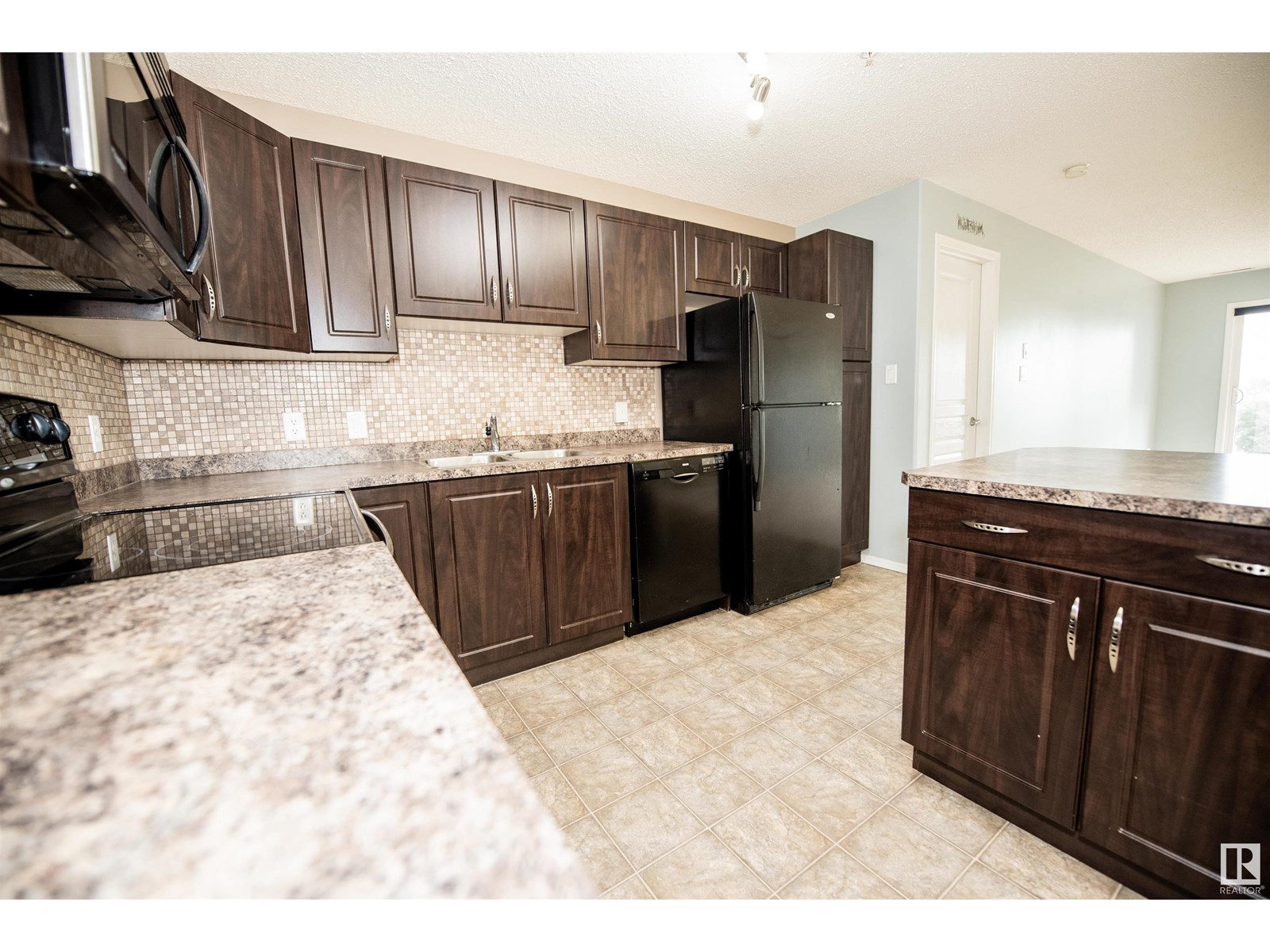 Property at #209 16035 132 ST NW image 2
