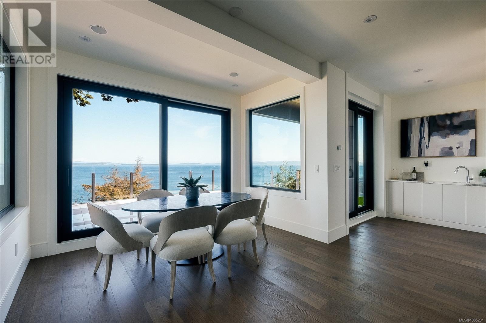 Property at 4599 Cordova Bay Rd image 2