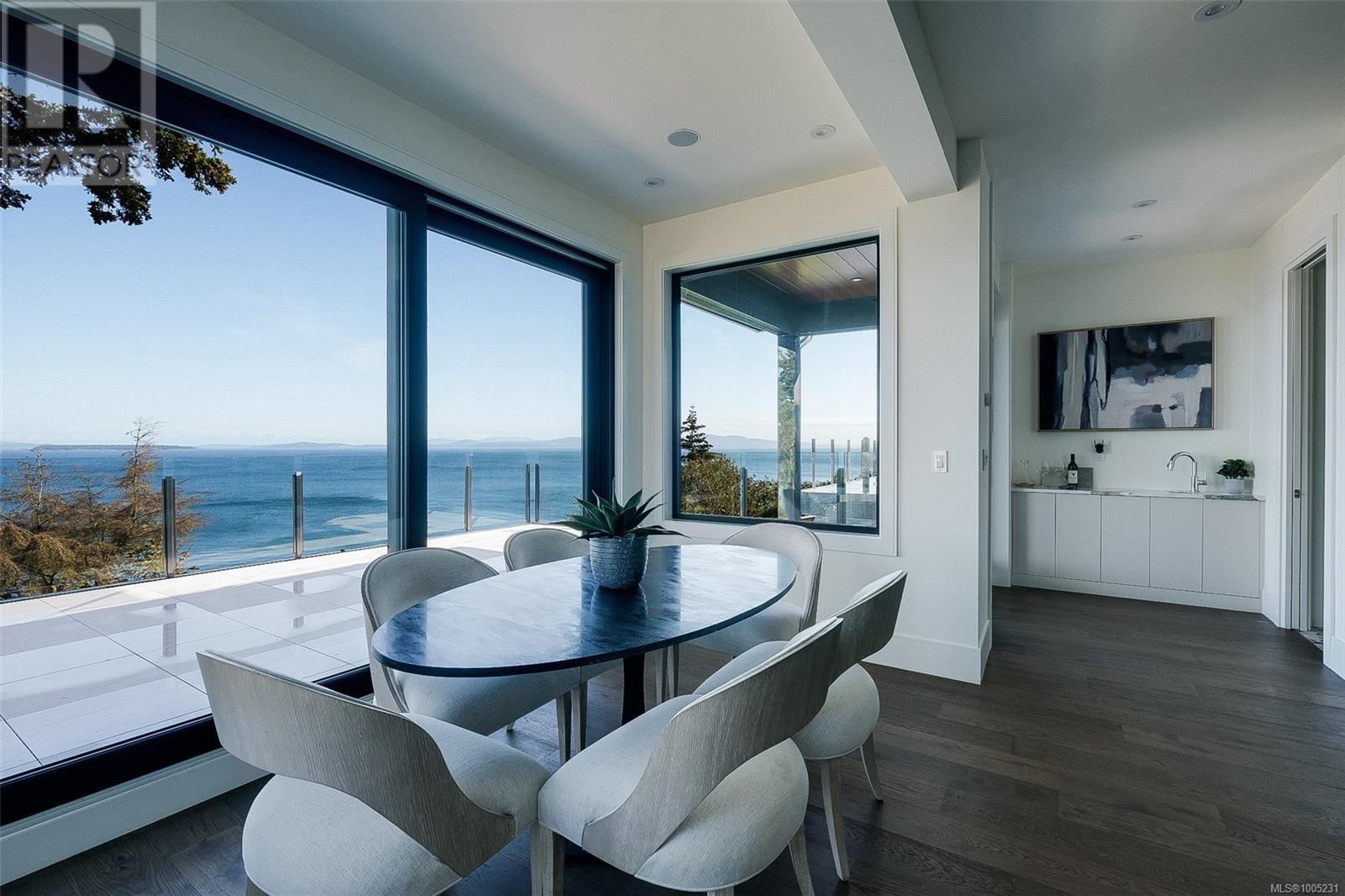 Property at 4599 Cordova Bay Rd image 3
