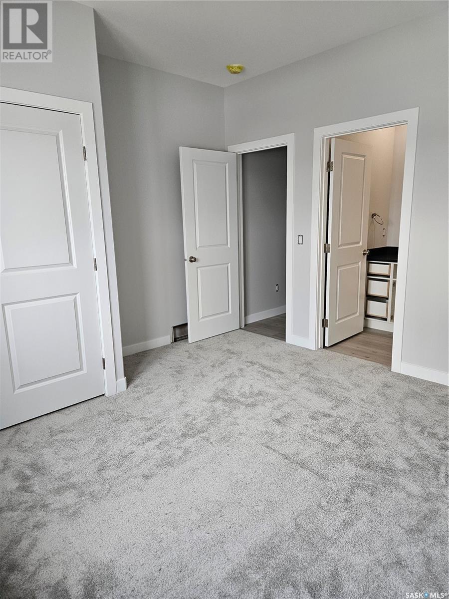 848 Delaet Bay, Warman, Saskatchewan  S0K 0A1 - Photo 13 - SK008508