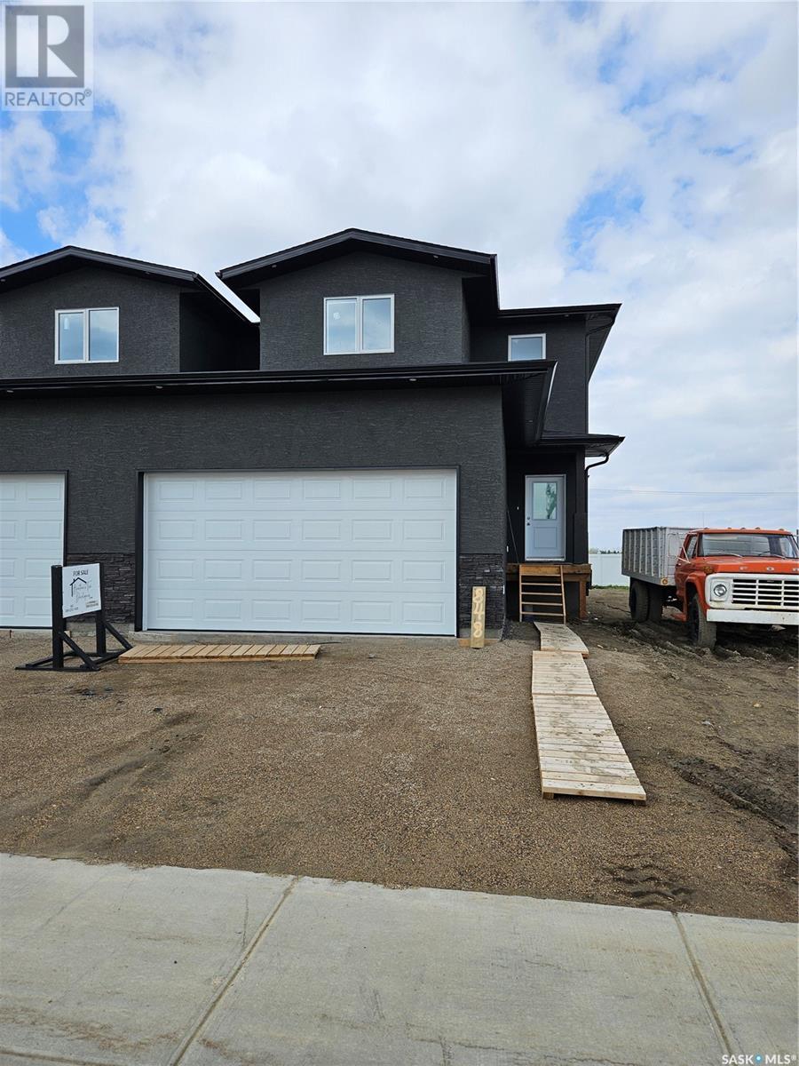 848 Delaet Bay, Warman, Saskatchewan  S0K 0A1 - Photo 2 - SK008508