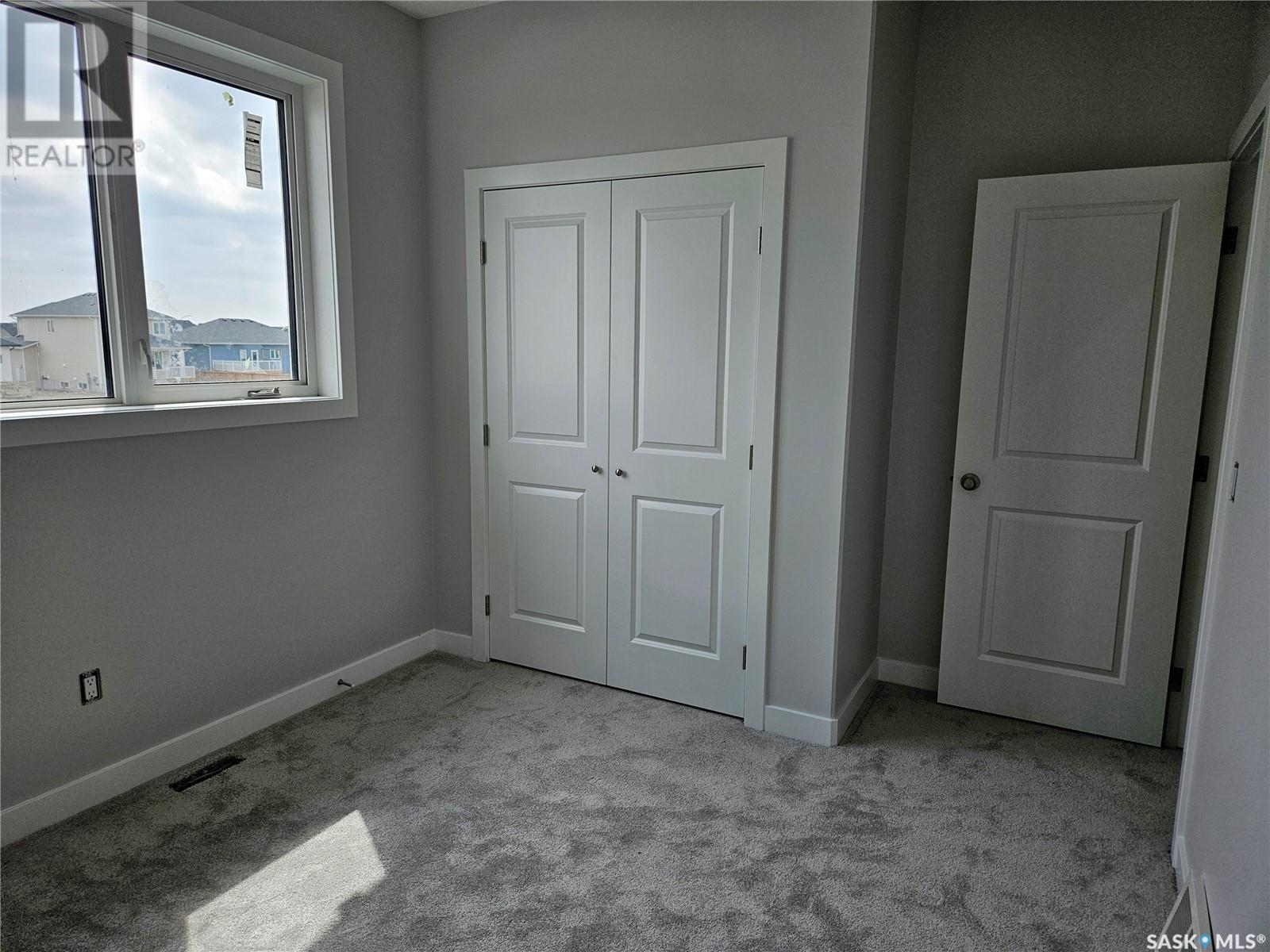 848 Delaet Bay, Warman, Saskatchewan  S0K 0A1 - Photo 31 - SK008508