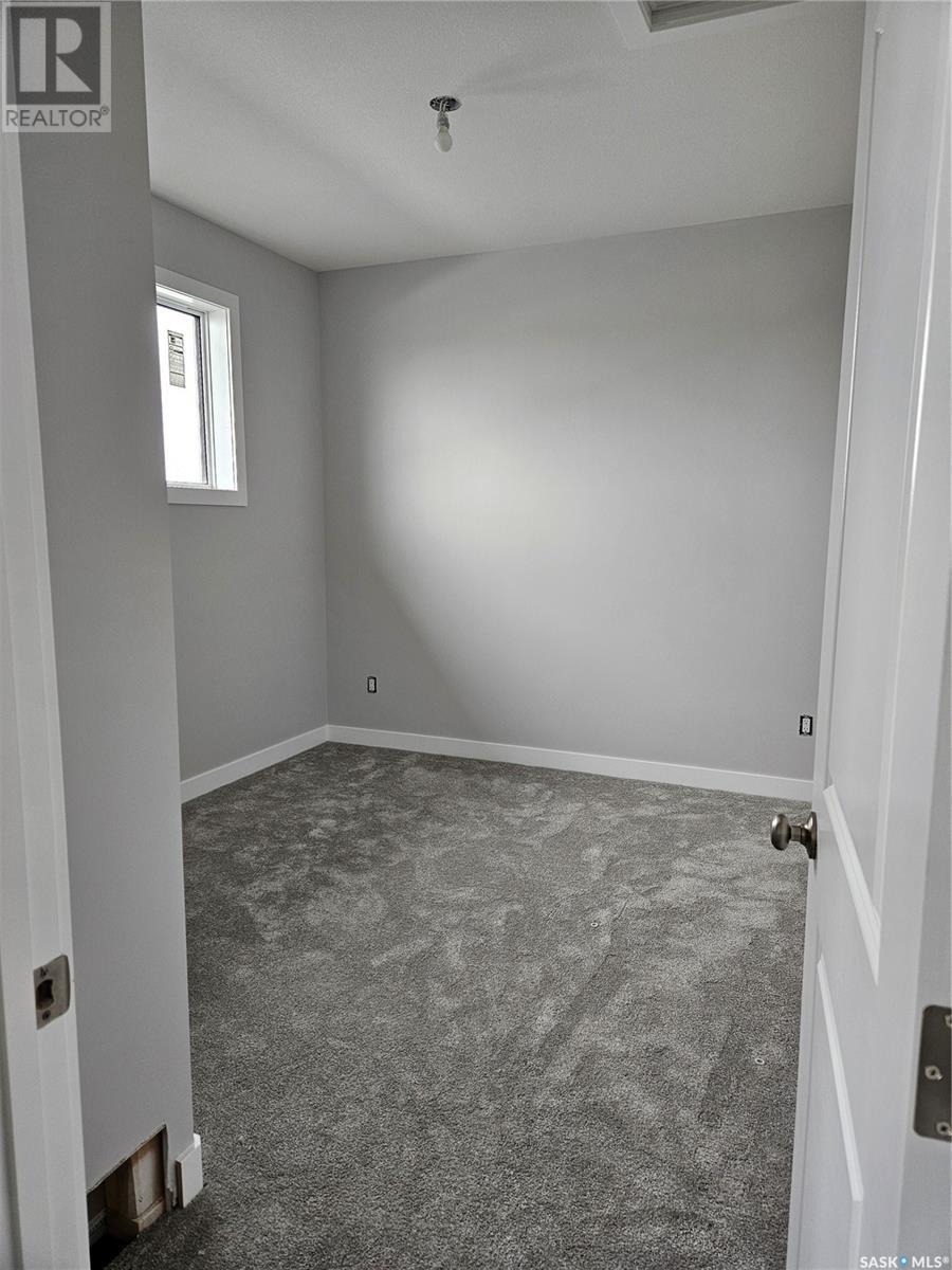 848 Delaet Bay, Warman, Saskatchewan  S0K 0A1 - Photo 21 - SK008508