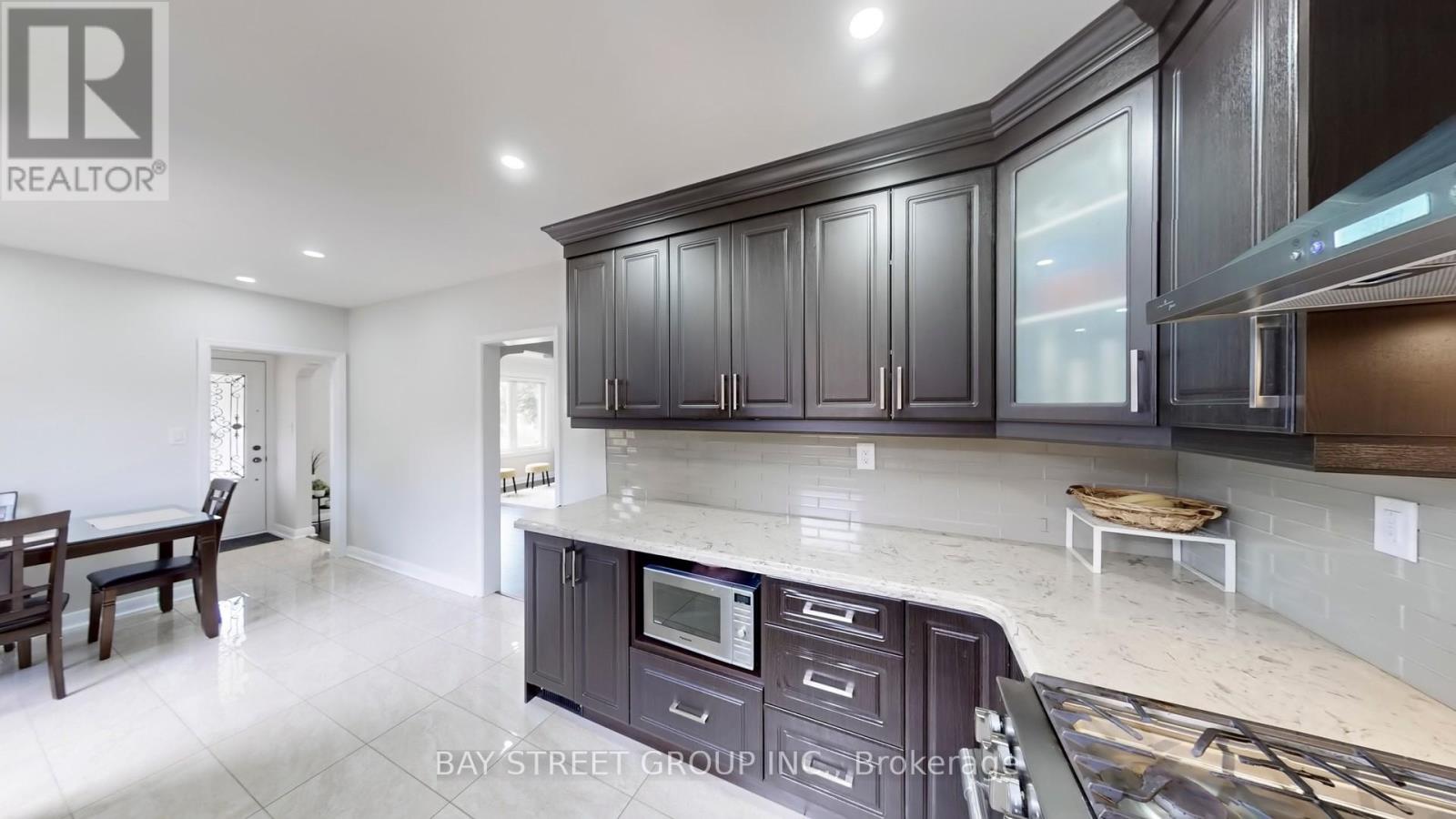 15 Macleod Street, Toronto, Ontario  M6L 2M7 - Photo 10 - W12263116