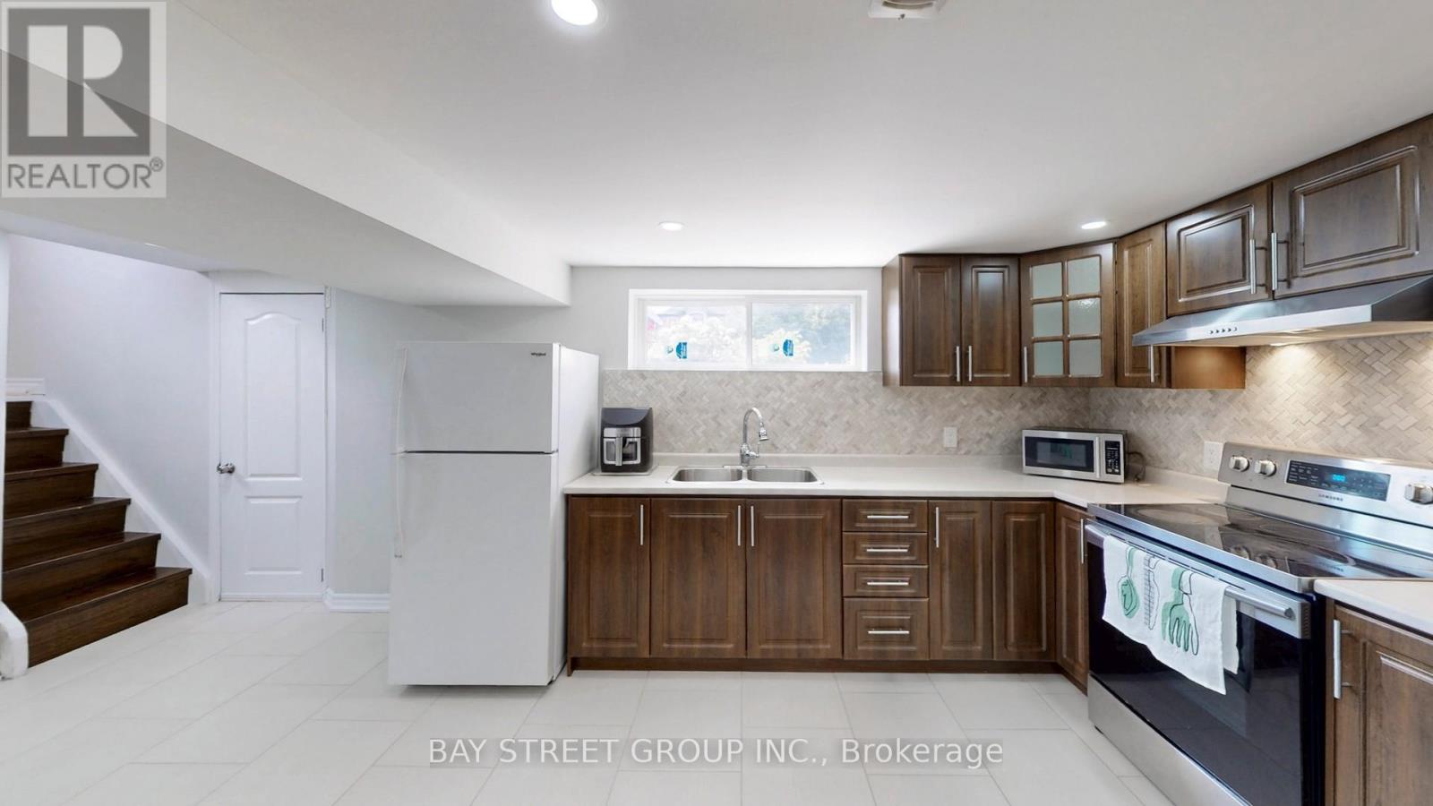 15 Macleod Street, Toronto, Ontario  M6L 2M7 - Photo 24 - W12263116