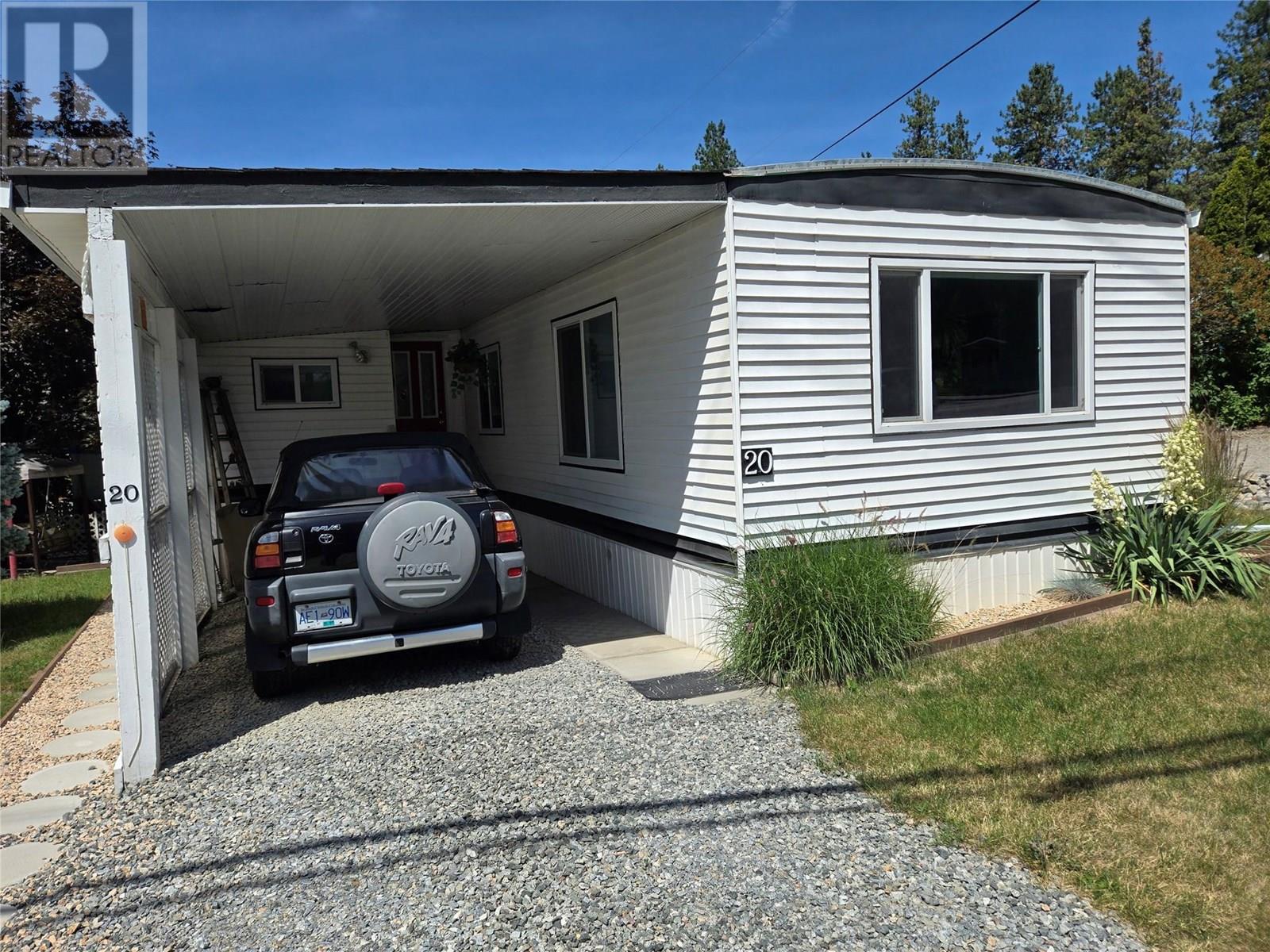 COULD THIS BE THE MOST AFFORDABLE RETIREMENT LIVING IN THE VALLEY? This immaculate and fully updated 2-bedroom + den home in the 45+ Shannon Lake Estates community offers unbeatable value and comfort. Featuring a bright, open-concept layout with newer floors, roof, windows, furnace, and central A/C—this home is move-in ready! The spacious kitchen includes a skylight and reverse osmosis water system, while the living areas enjoy abundant natural light. The bedrooms are spacious, and the updated 4-piece bathroom adds modern flair. Gardeners will love the raised beds, and landscaped yard. Extras include a water softener, new washer/dryer, a 16' x 22' detached workshop with 8-ft ceilings, a garden shed, and parking for up to 2 vehicles, but could be expanded easily. A large sunroom addition provides extra living space with afternoon sun. Located close to golf, shopping, and restaurants. One dog & one cat or two cats permitted (no rentals, 19+ for additional occupants). Don’t miss this gem—book your showing today and get ready to call this one ""Home""! Oh Yeah... Check out the monthly pad rental at only $525. Compare to most other parks with pad rentals hundreds of dollars more...This will save you thousands. (id:48254)