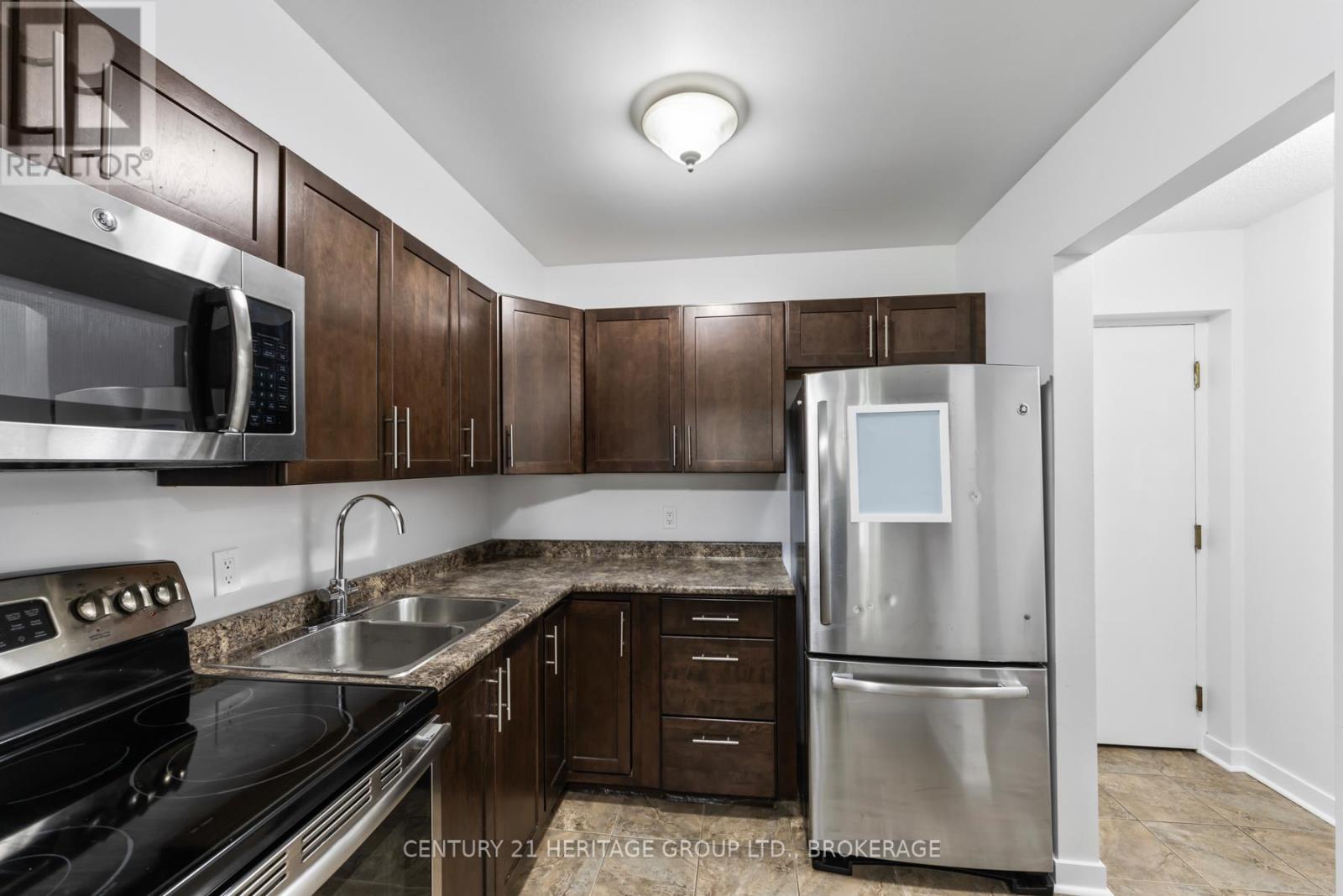 107 - 310 Kingsdale Avenue, Kingston, Ontario  K7M 8S1 - Photo 19 - X12264630