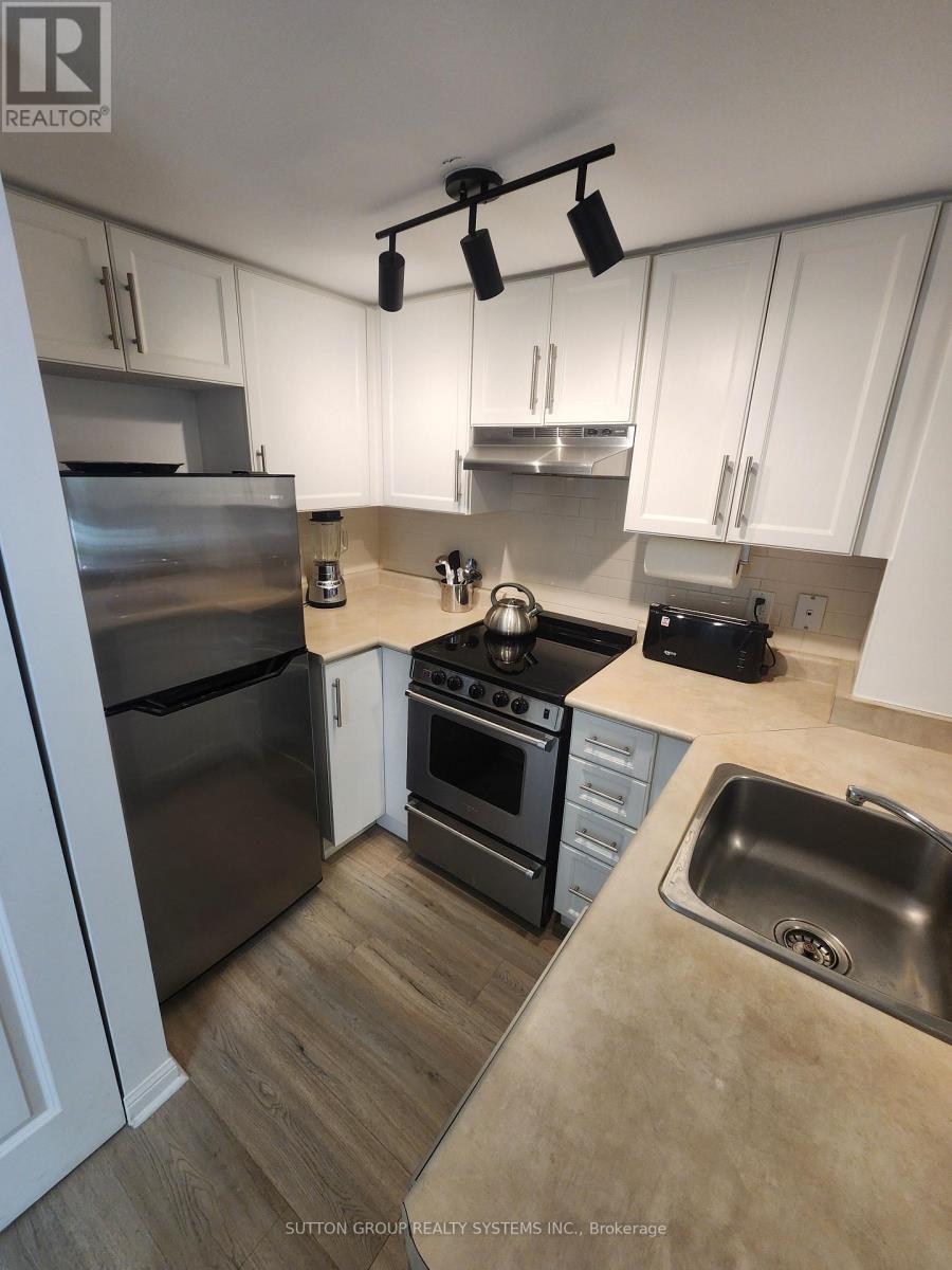 Th20 - 93 The Queensway, Toronto, Ontario  M6S 5A7 - Photo 6 - W12264964