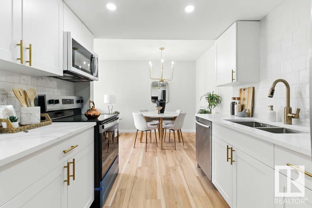 Property at #210 2908 116A AV NW image 2