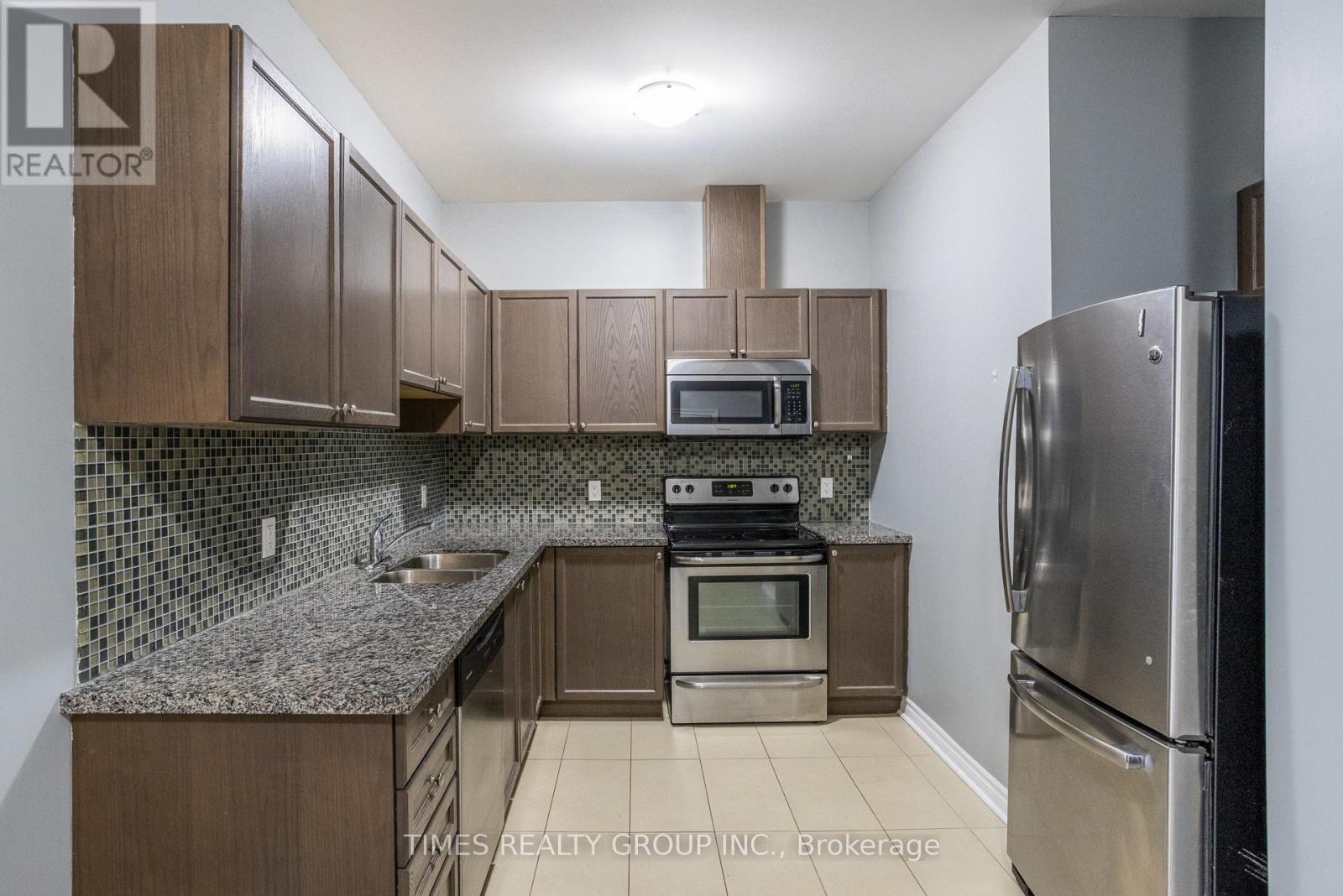 105 - 384 Rogers Street, Peterborough East, Ontario  K9H 7B6 - Photo 2 - X12266968