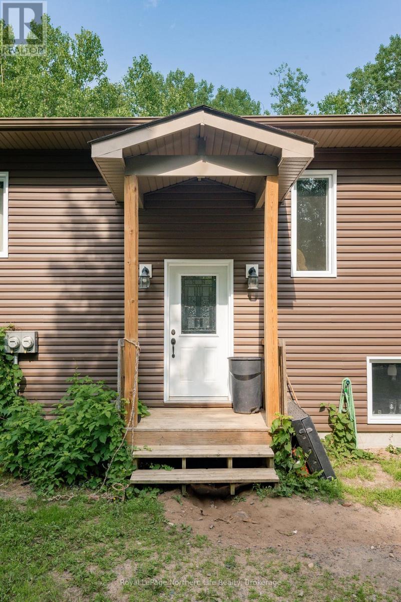 522 Hart Road, Callander, Ontario  P0H 1H0 - Photo 4 - X12267364