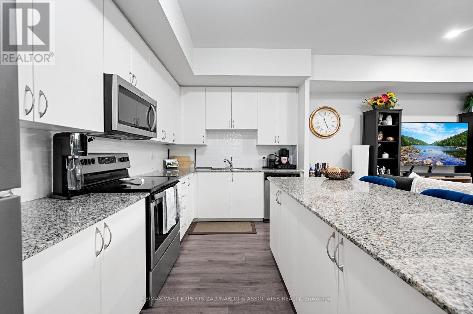 C202 - 5299 Highway 7 Road, Vaughan (Vaughan Grove), Ontario  L4L 1T4 - Photo 16 - N12267738