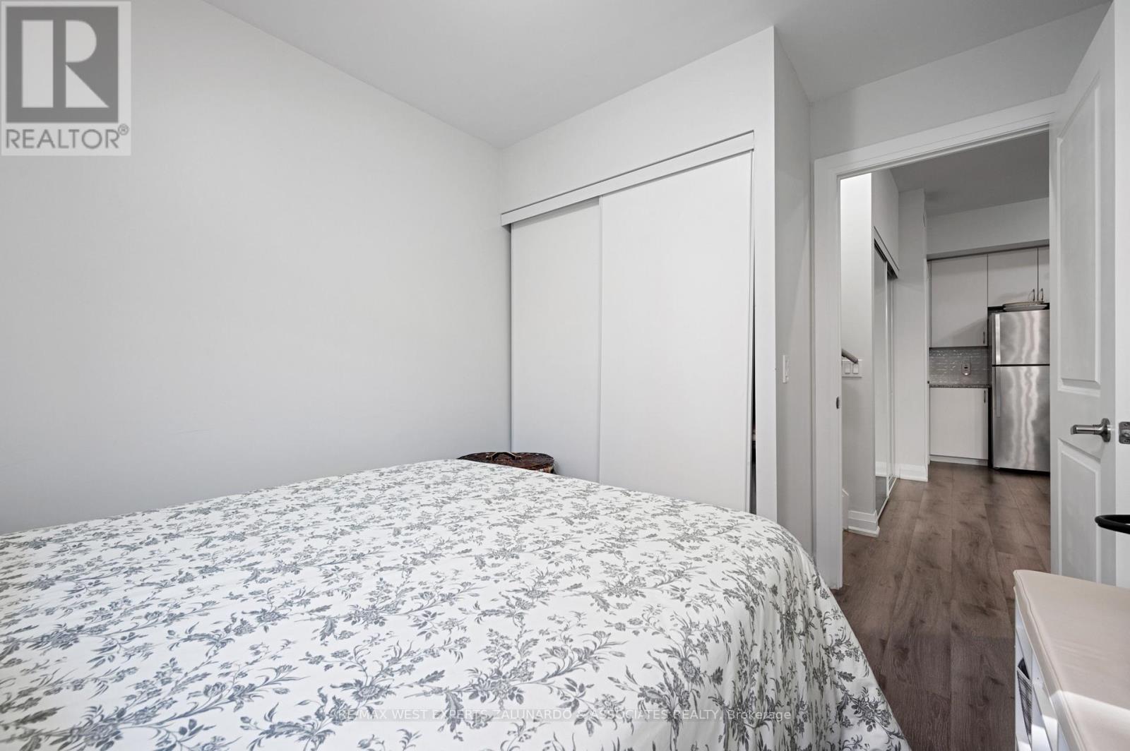 C202 - 5299 Highway 7 Road, Vaughan (Vaughan Grove), Ontario  L4L 1T4 - Photo 18 - N12267738