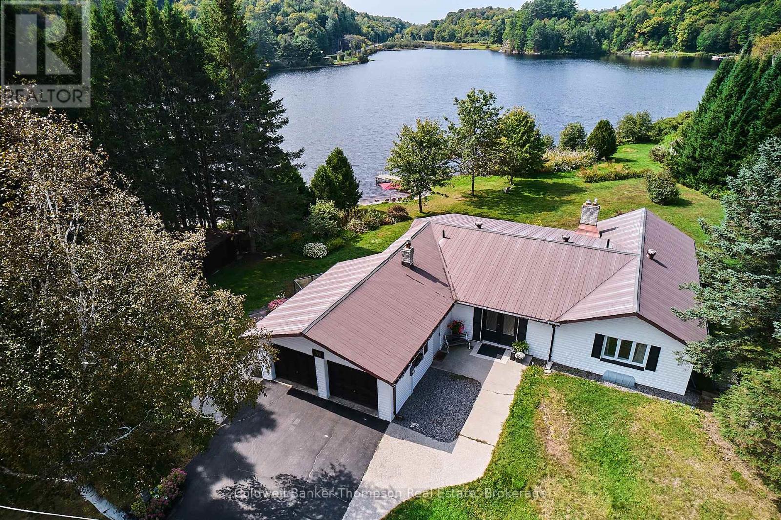 32 Beach Road, Huntsville, Ontario  P0B 1M0 - Photo 4 - X12267828