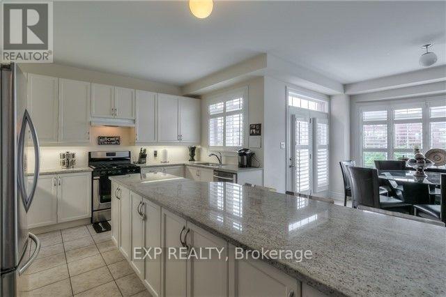 44 Intrigue Trail, Brampton, Ontario  L6X 0W9 - Photo 8 - W12268172