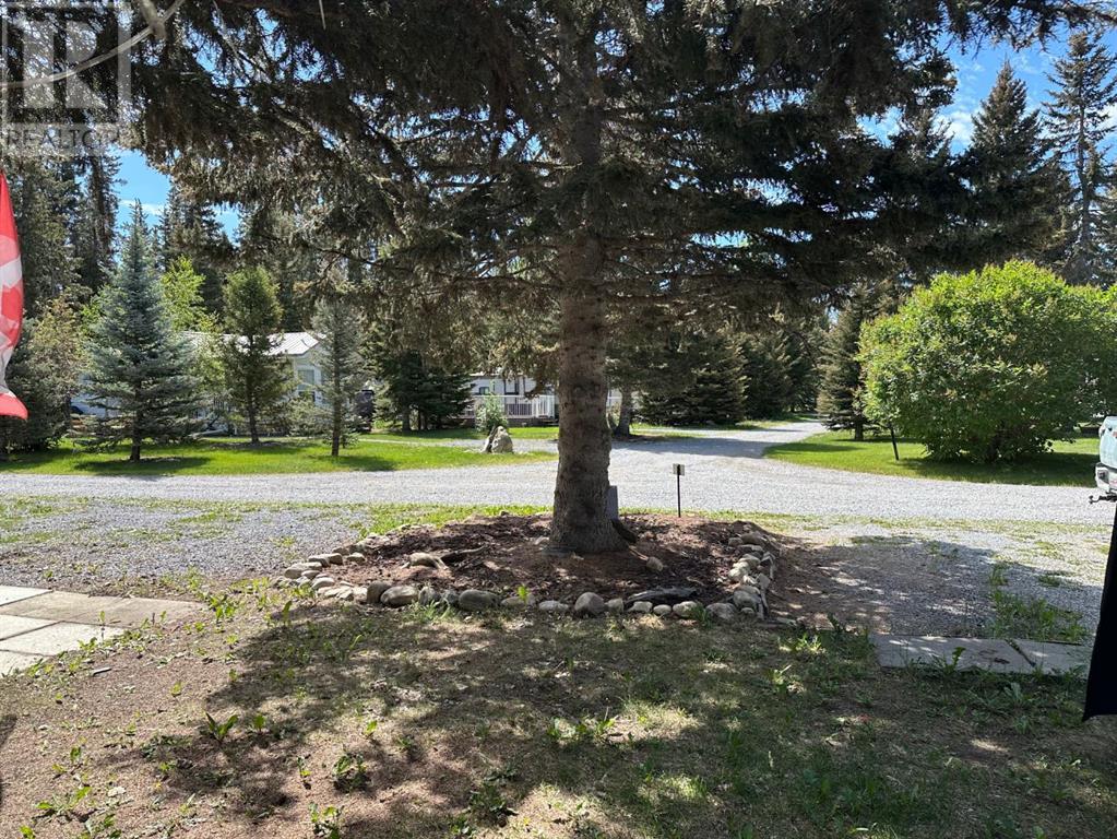 212, Tall Timber Leisure Park, Rural Mountain View County, Alberta  T0M 1X0 - Photo 2 - A2236007