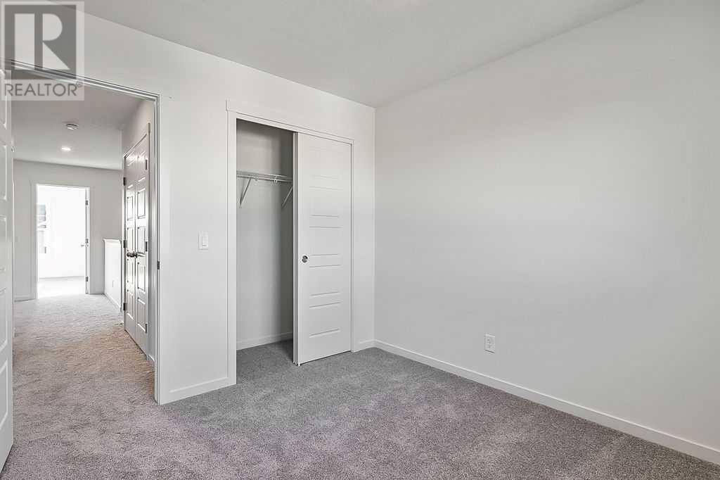 838 Creekside Boulevard Sw, Calgary, Alberta  T2X 5H2 - Photo 22 - A2222964