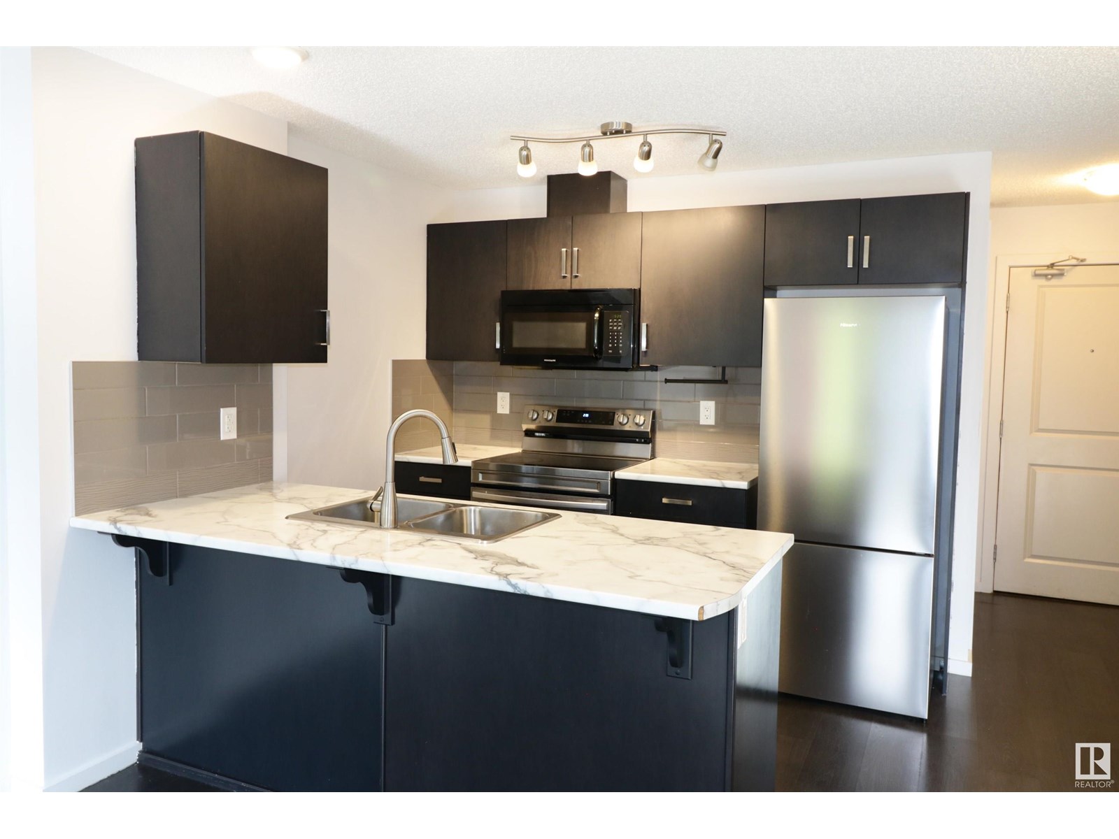 Property at #232 5515 7 AV SW image 1