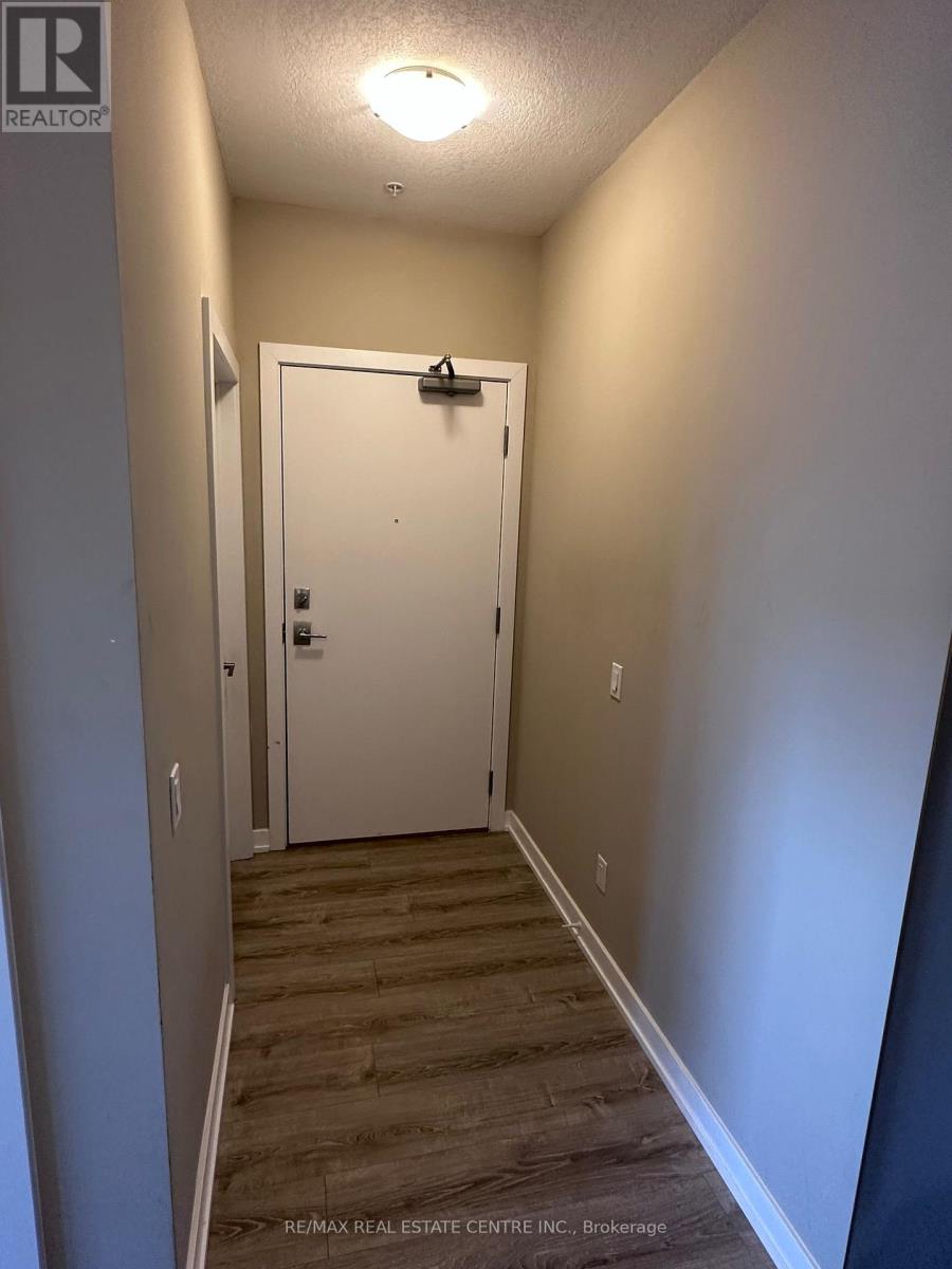 313 - 10 Esplanade Lane, Grimsby, Ontario  L3M 0H1 - Photo 2 - X12270610