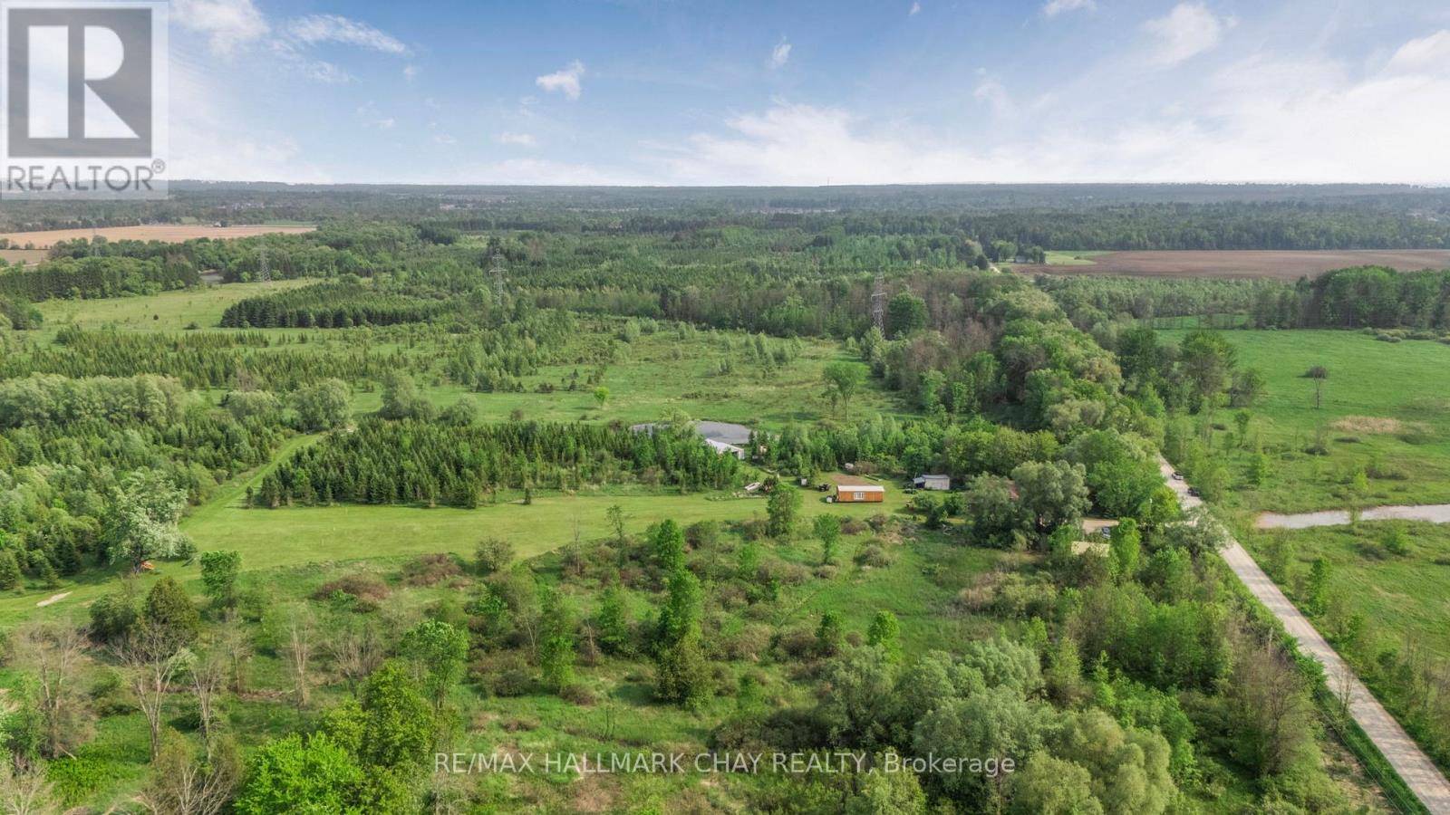 9205 Mckinnon Road, Essa (Angus), Ontario  L3W 0V9 - Photo 11 - N12271463