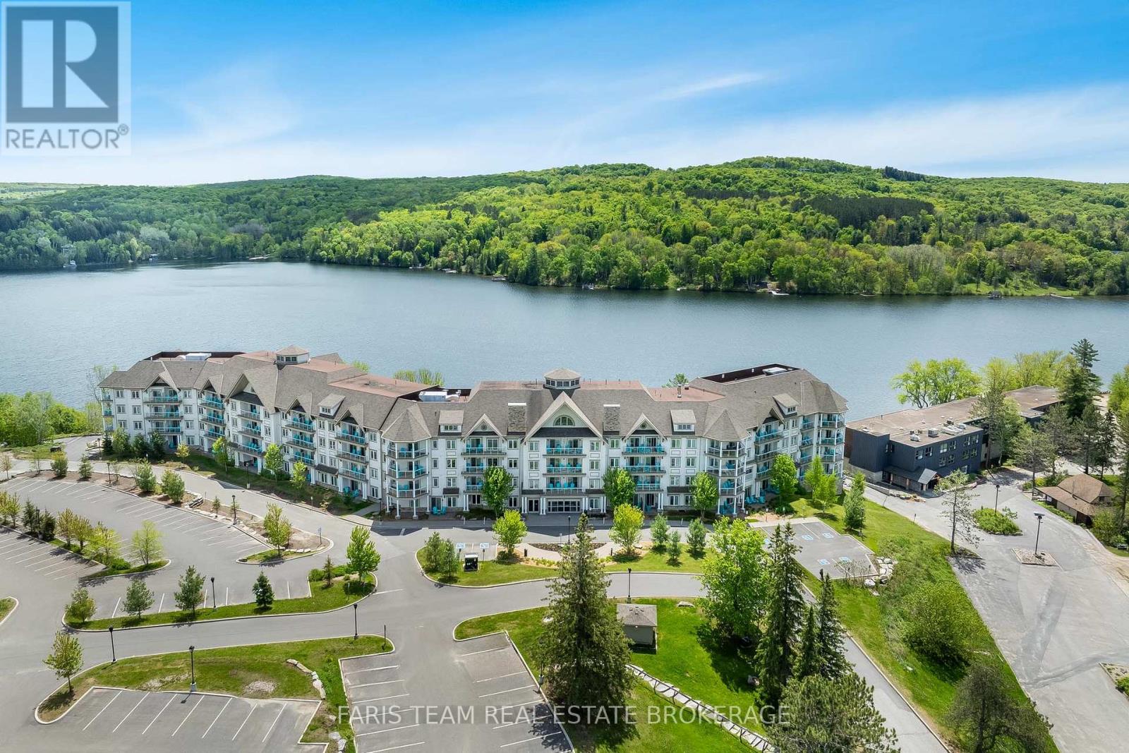 218 - 25 Pen Lake Point Road, Huntsville (Chaffey), Ontario  P1H 1A9 - Photo 2 - X12271456