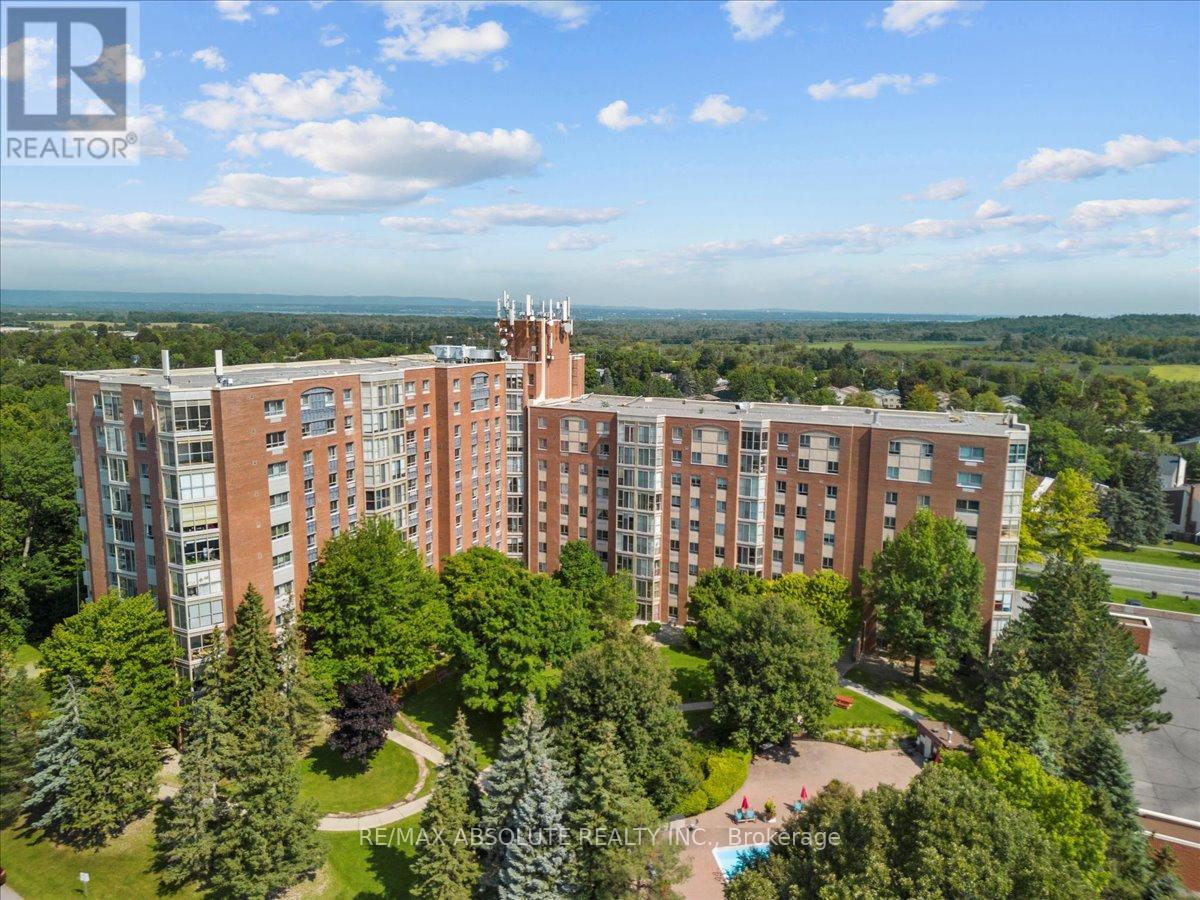 960 Teron Drive 719 Ottawa, Ontario OPEN HOUSE SAT 2-4PM Amazing location, sought after building with INCREDIBLE amenities & a TOTALLY renovated unit! The Atriums of Kanata is a very DESIRED super clean, safe & social building! On the 7th floor you have the BEST views of the city & the tree tops PLUS this unit faces North West allowing for sunset views & views of the common areas! Engineered hardwood throughout! Freshly painted in super pretty tone! A NEW modern WHITE lacquer kitchen - modern but NOT TOO modern! Very bright living, open concept floor plan! The OPEN solarium makes a perfect office space! This unit has ALL new windows! The primary can accommodate a king bed & offers easy access to the ensuite that offers a STEP in shower! Good size second bedroom! The main bath has a full tub & shower combo (rare feature) Parking & locker included! Enjoy the pool, sauna, tennis, pickle ball, hobby shop & so much more! LOTS of visitor parking spaces for your guests! (id:48254)