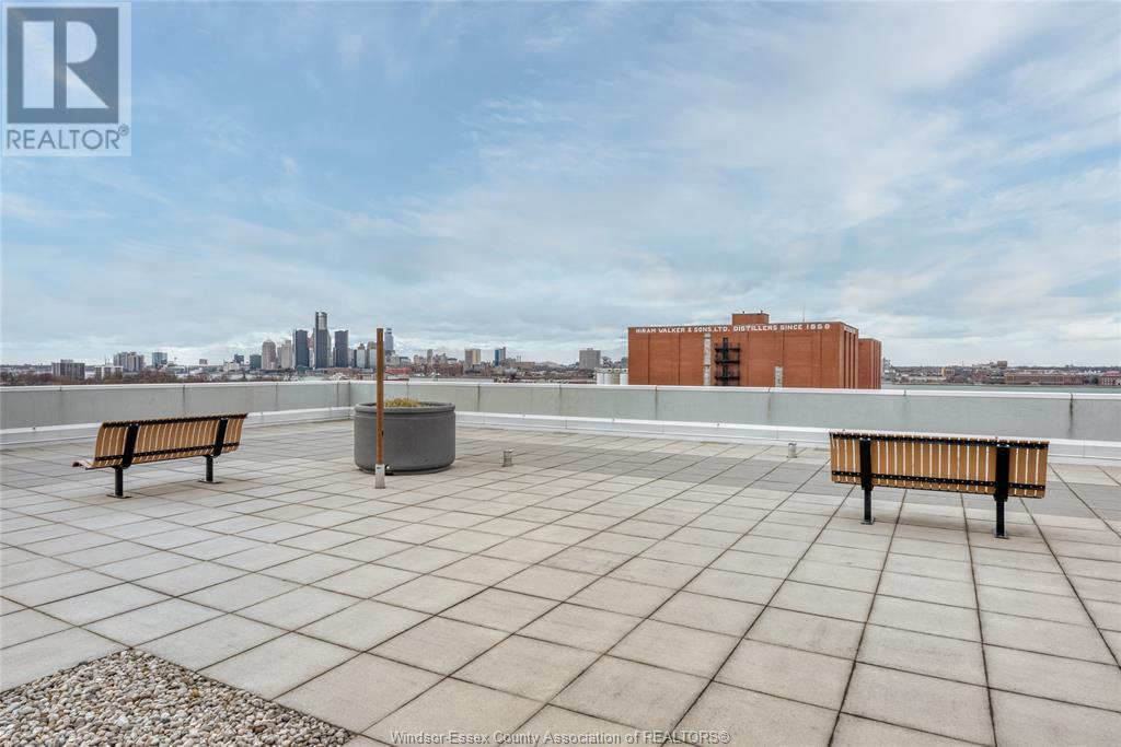 Property at 2175 WYANDOTTE STREET East Unit# 107 image 2