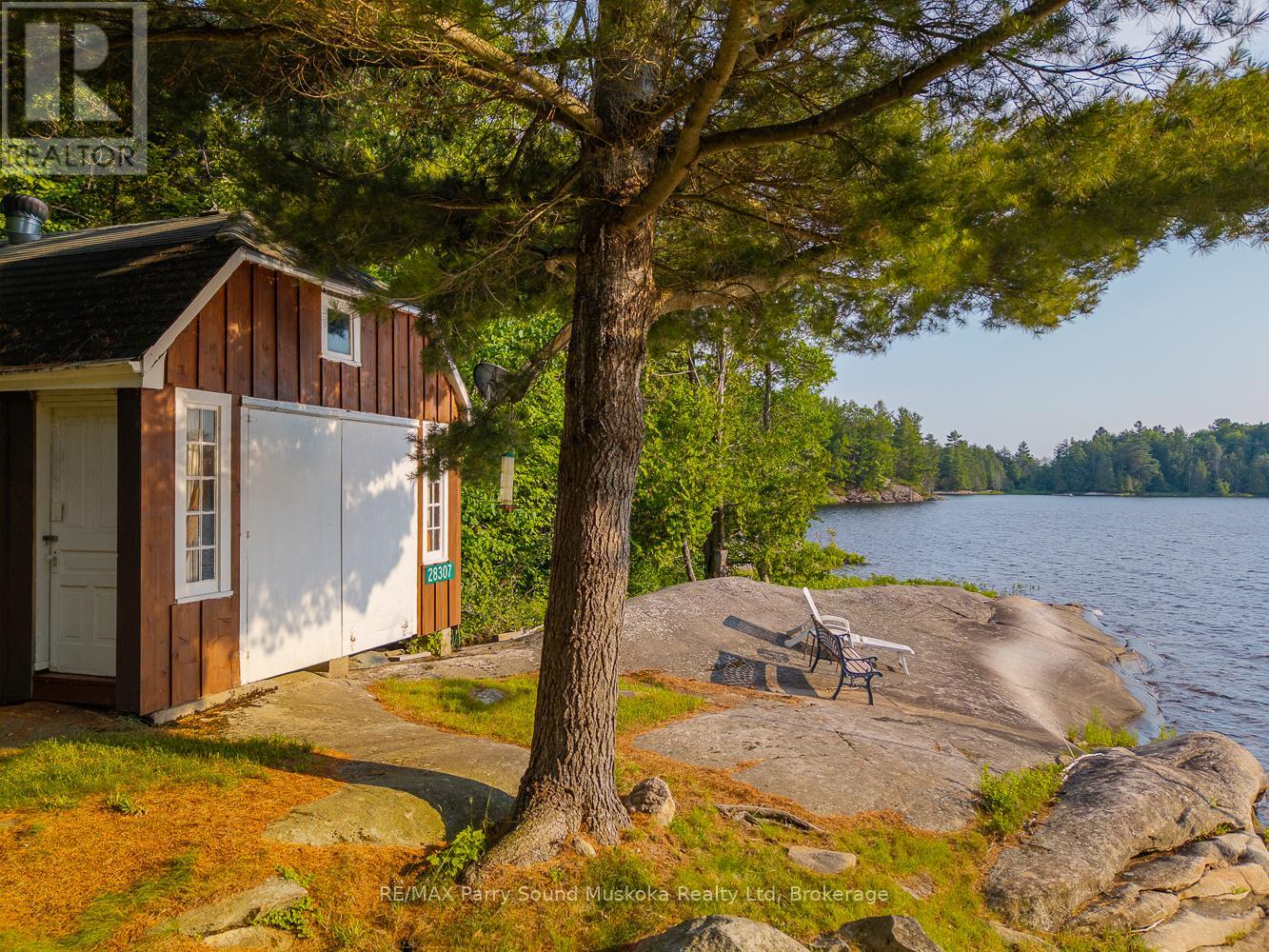 28307 Wahwashkesh Lake, Whitestone, Ontario  P0A 1G0 - Photo 2 - X12268465