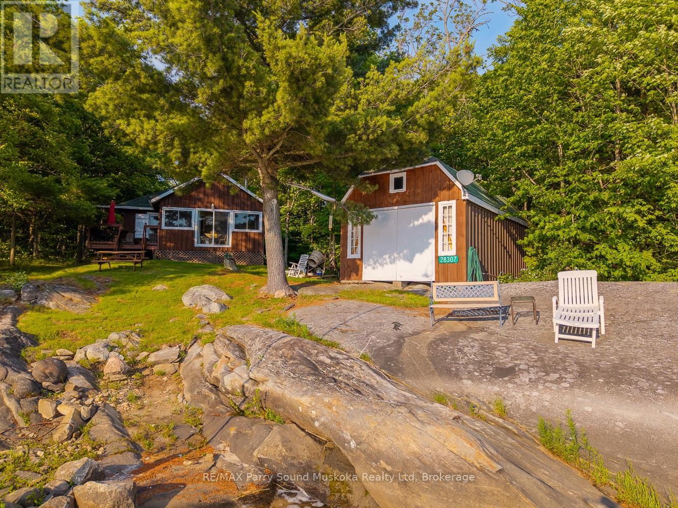 28307 Wahwashkesh Lake, Whitestone, Ontario  P0A 1G0 - Photo 12 - X12268465