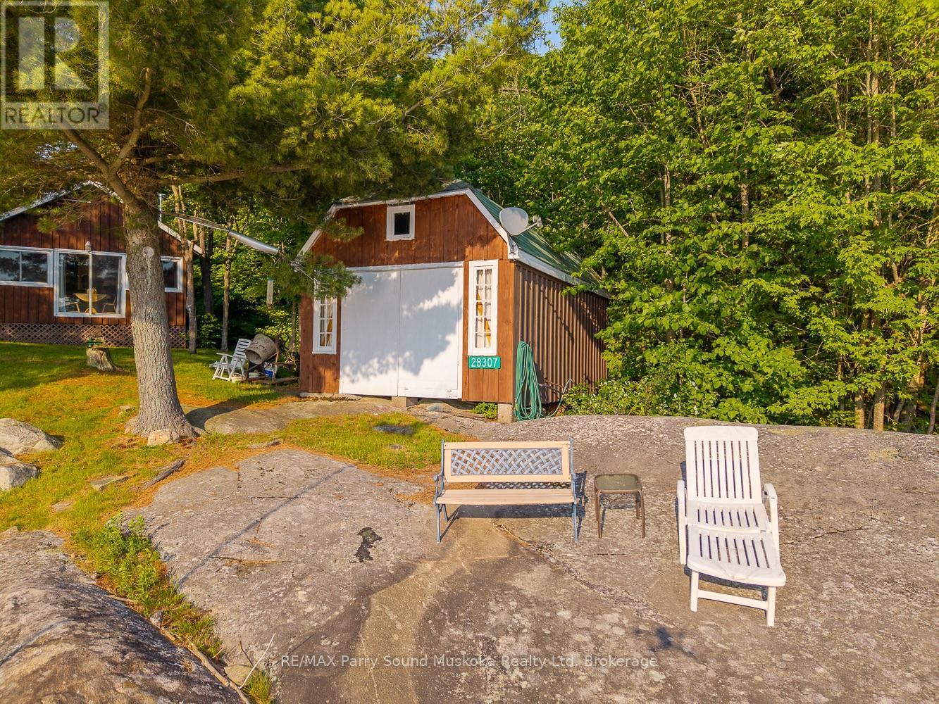 28307 Wahwashkesh Lake, Whitestone, Ontario  P0A 1G0 - Photo 13 - X12268465