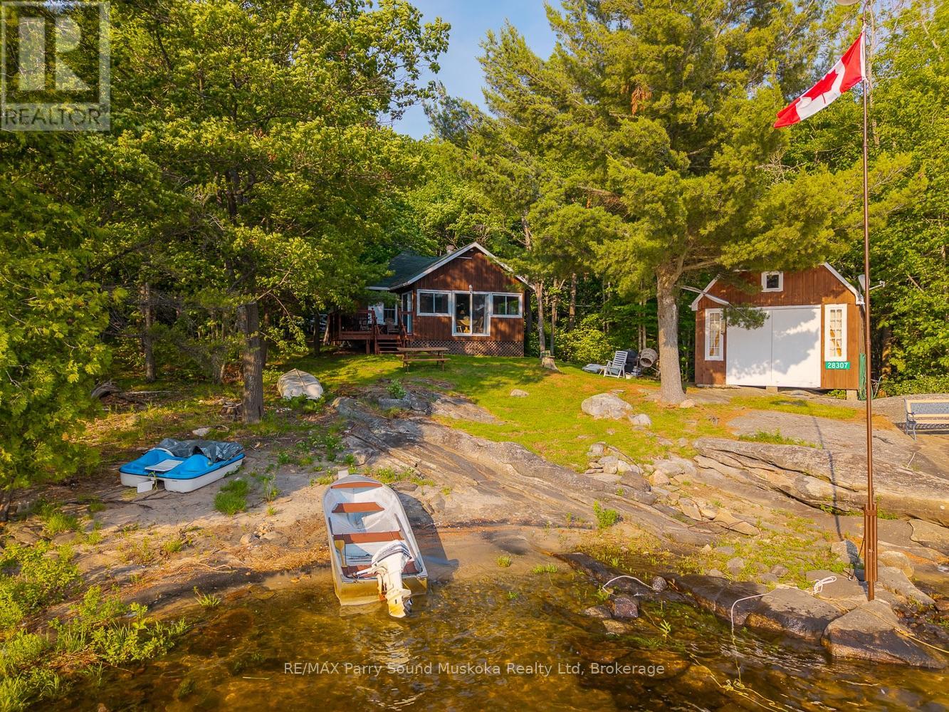 28307 Wahwashkesh Lake, Whitestone, Ontario  P0A 1G0 - Photo 9 - X12268465