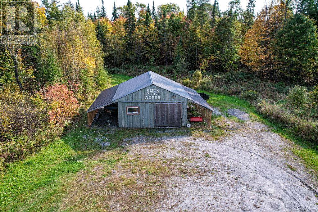 410 Etwell Road, Huntsville (Stisted), Ontario  P1H 2J2 - Photo 38 - X12273214