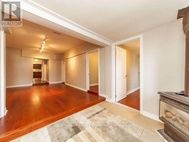 257 Parkwood Avenue, Georgina, Ontario  L4P 2X2 - Photo 3 - N12273220