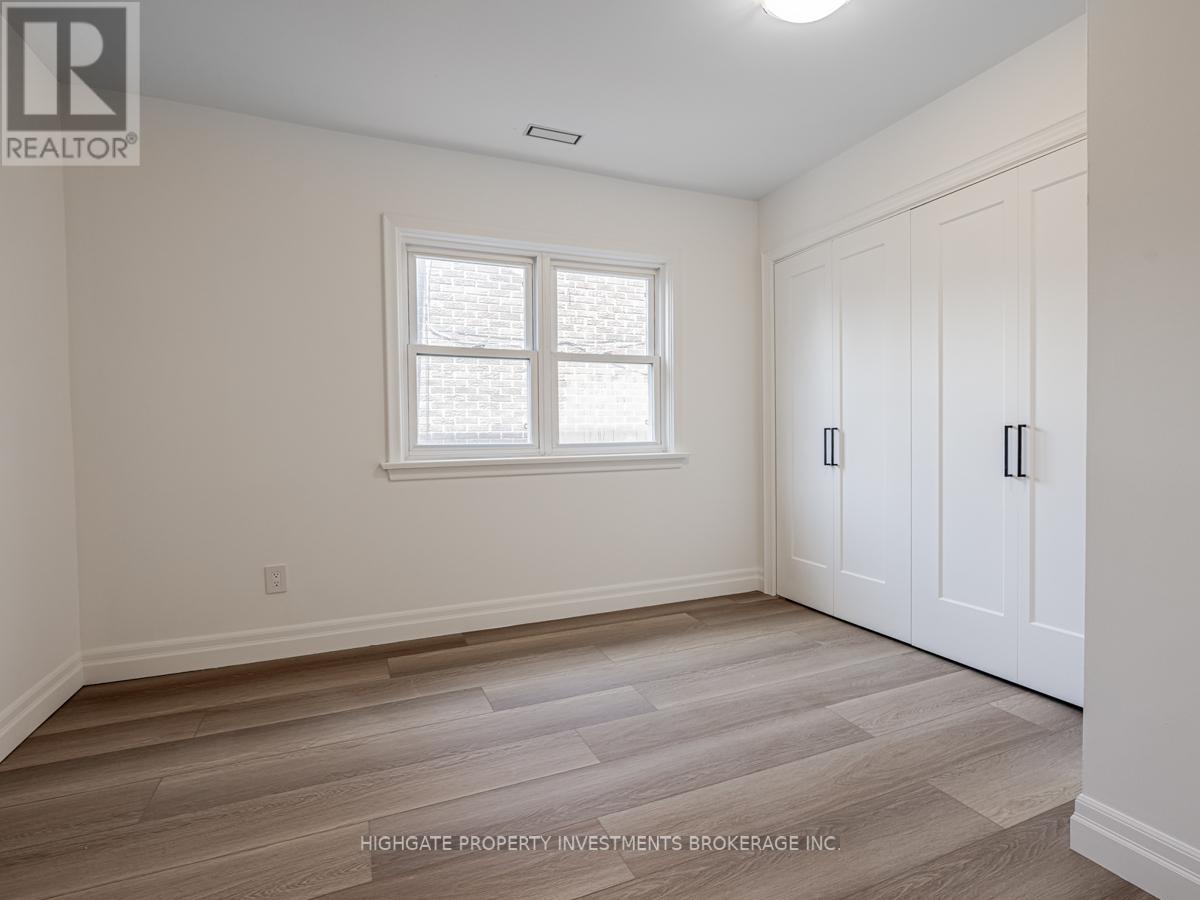 Back - 170 Ennerdale Road, Toronto, Ontario  M6E 4C9 - Photo 13 - W12274504