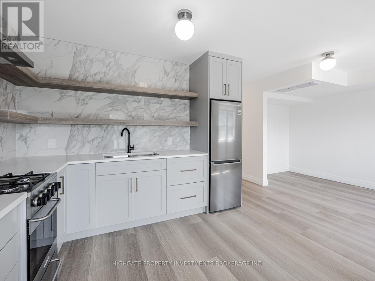 Back - 170 Ennerdale Road, Toronto, Ontario  M6E 4C9 - Photo 2 - W12274504