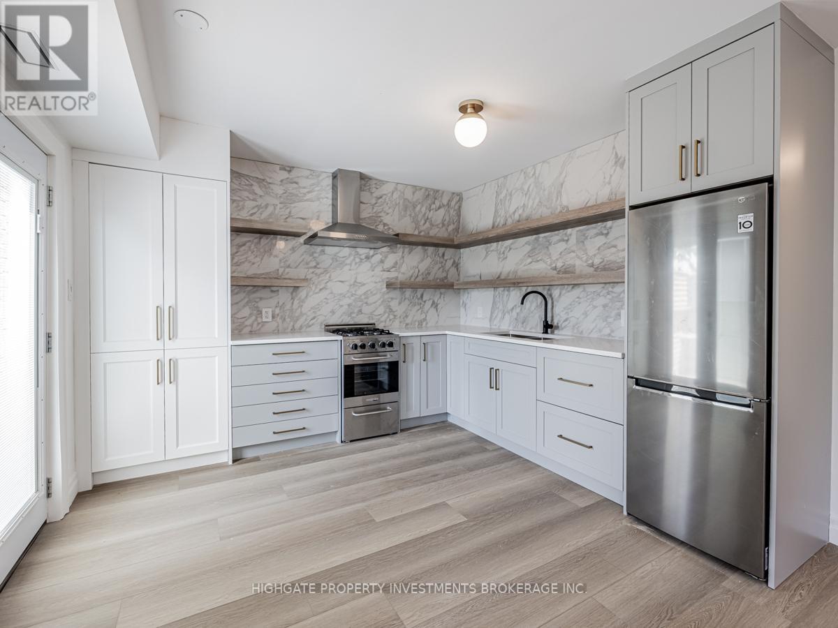 Back - 170 Ennerdale Road, Toronto, Ontario  M6E 4C9 - Photo 5 - W12274504