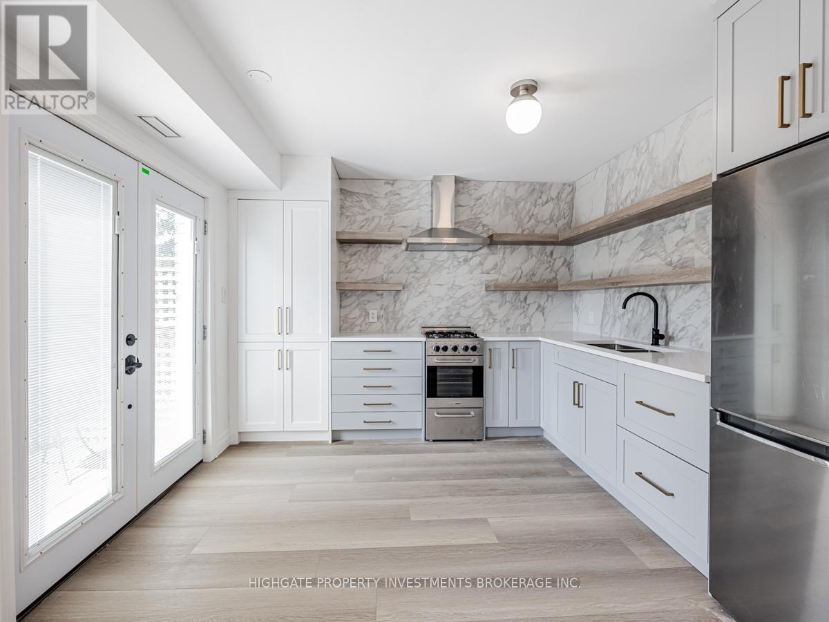 Back - 170 Ennerdale Road, Toronto, Ontario  M6E 4C9 - Photo 6 - W12274504