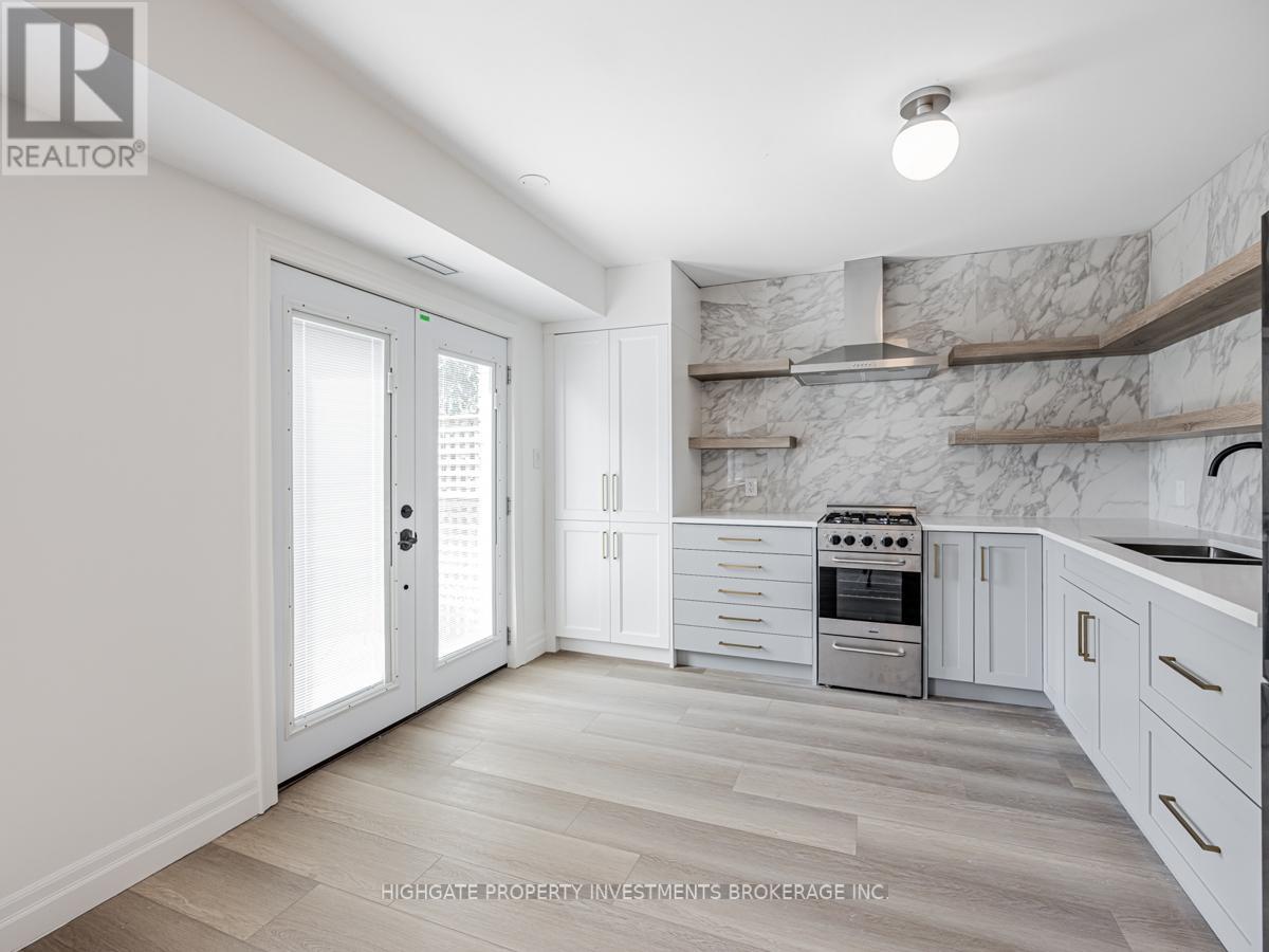Back - 170 Ennerdale Road, Toronto, Ontario  M6E 4C9 - Photo 7 - W12274504
