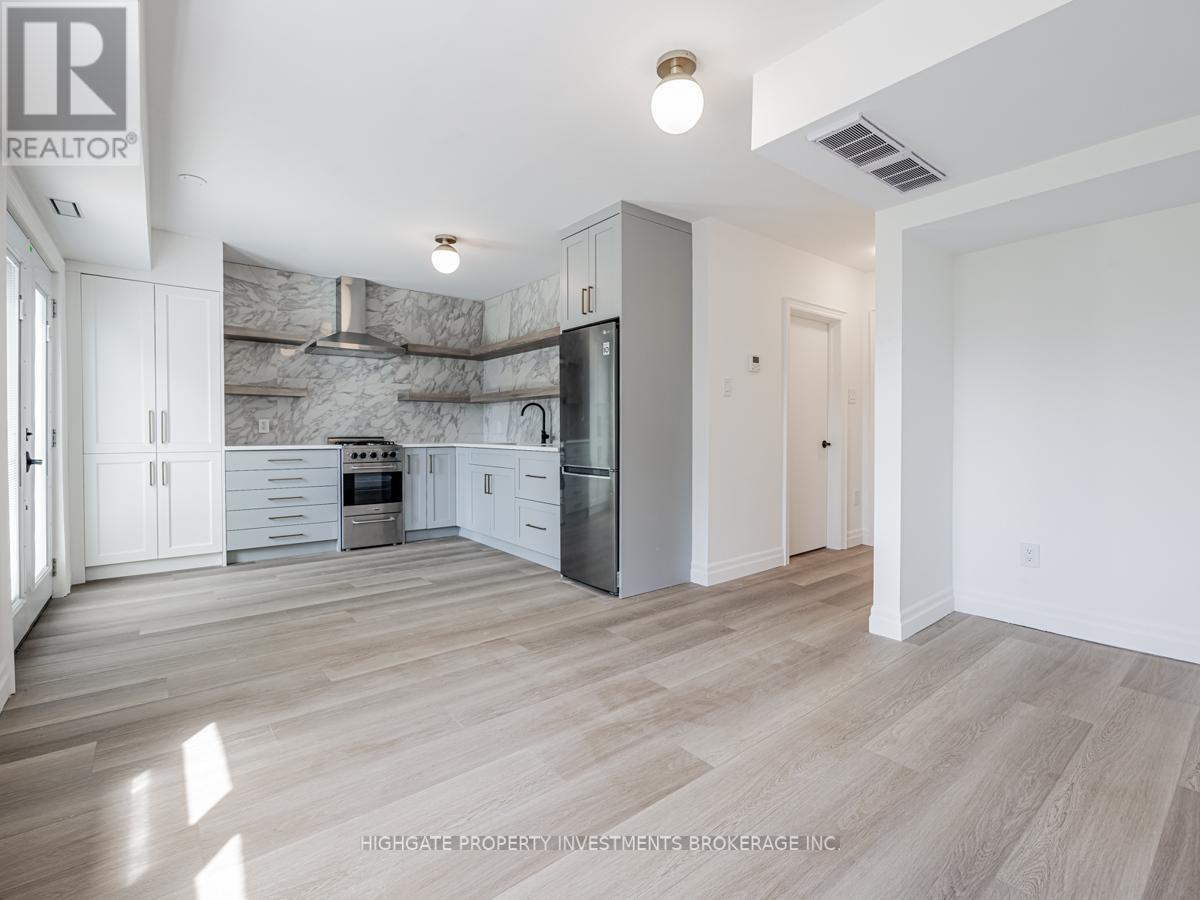 Back - 170 Ennerdale Road, Toronto, Ontario  M6E 4C9 - Photo 8 - W12274504