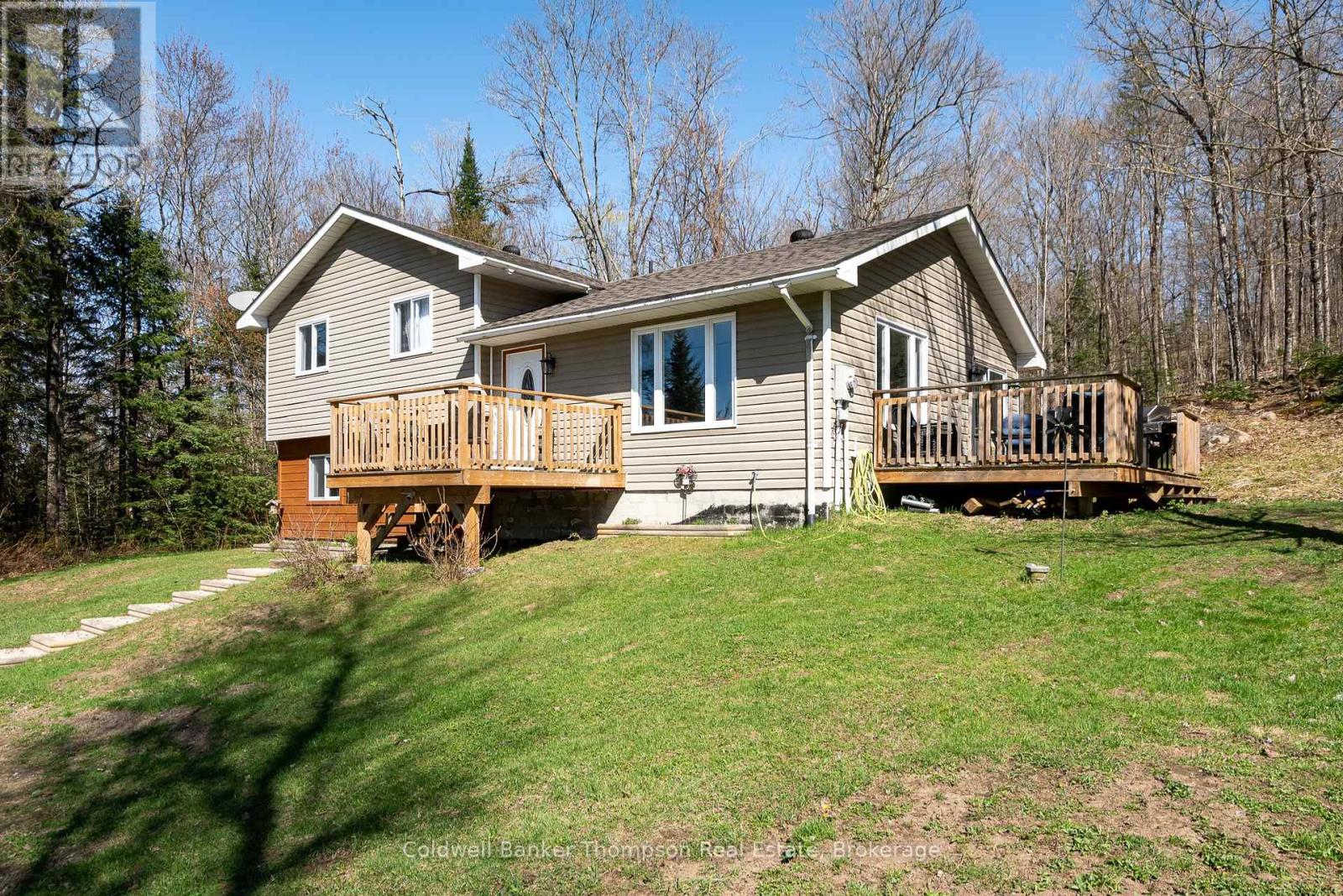 751 Old Muskoka Road, Huntsville, Ontario  P0B 1M0 - Photo 2 - X12274849