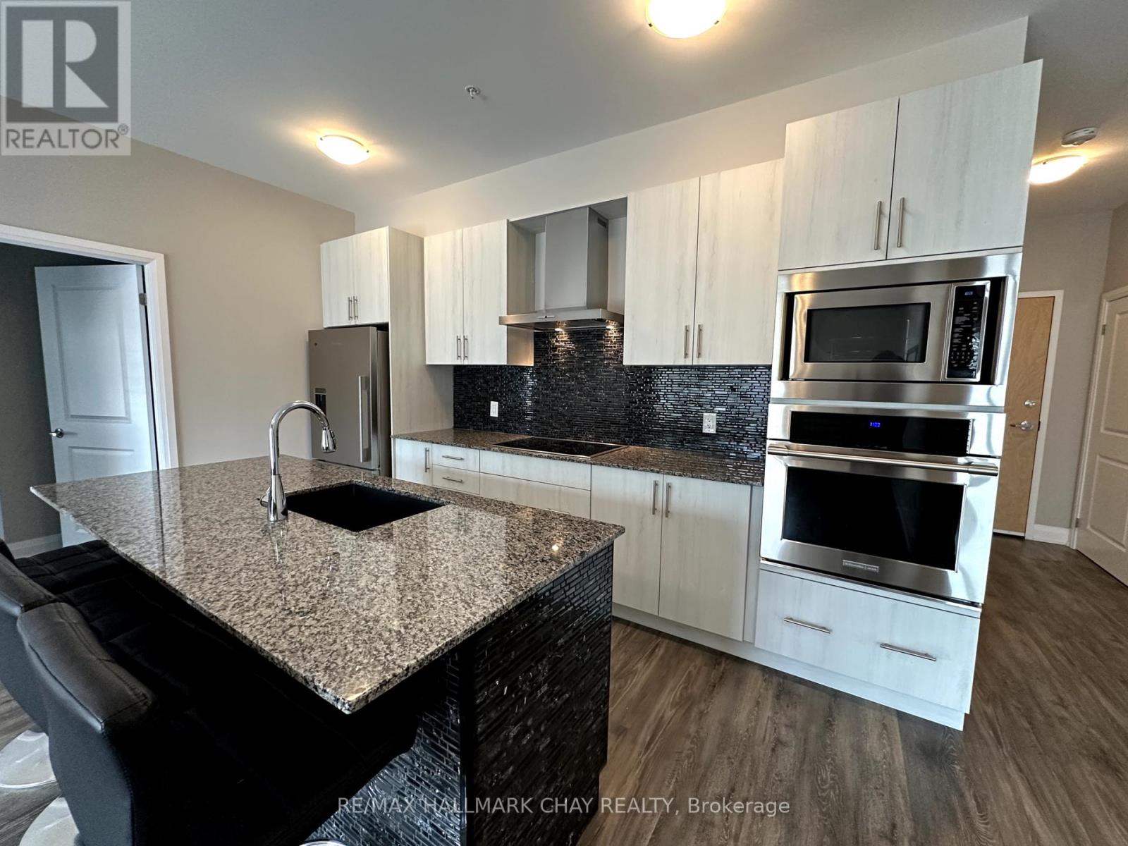 107 - 64 Queen Street S, New Tecumseth, Ontario  L0G 1W0 - Photo 18 - N12275189